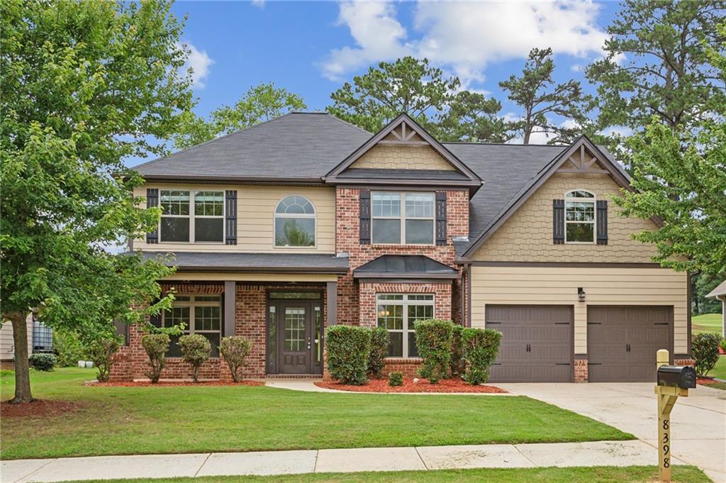 Welcome to your personal oasis, perfectly positioned on a premium golf course lot in Jonesboro! Now completely renovated, this stunning detached residence offers an unparalleled lifestyle of leisure and sophistication. From the moment you arrive, you'll be captivated by the charming front porch, accentuated with a distinctive metal bay top, inviting you to discover the elegance within.
Step inside this exquisite 5-bedroom, 3.5-bath home and be greeted by an expansive 3,108 square feet of meticulously designed living space. Gleaming hardwood floors flow through the foyer, kitchen, and breakfast area, creating a warm and welcoming atmosphere. The heart of the home is the gourmet kitchen, a chef's dream featuring beautiful quartz countertops, stainless steel appliances , a pantry , and a large island with a breakfast bar that offers a view into the inviting great room , complete with a cozy gas-starter fireplace. High 9-foot ceilings on both the main and upper levels enhance the sense of space and light throughout.
The main level hosts an impressive primary suite, providing a private and serene retreat. The ensuite bath is a spa-like haven, complete with a custom-tiled shower featuring a sleek glass door, a separate soaking tub , a double vanity, and chic oil-rubbed plumbing fixtures.
Originally built in 2014 , this traditional brick-front home has been transformed to combine classic architecture with the latest modern comforts. Enjoy the community amenities, including swim and tennis facilities, perfect for an active and social lifestyle. With a two-car attached garage and a prime location, this property is the complete package.
This is a MUST-SEE property that offers a unique opportunity for refined living. Don't wait—schedule your private showing today!