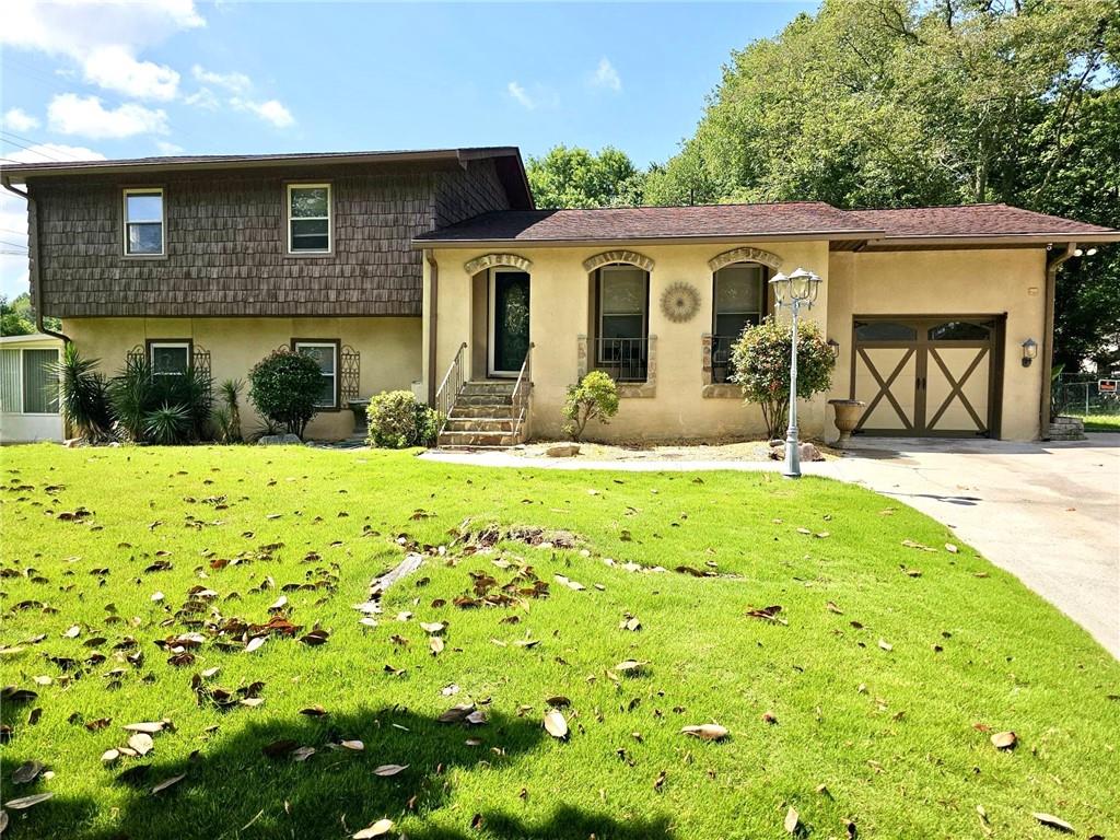 This unique entertaining house sits on a quiet dead end street. It has 4 bedrooms and 3 bathrooms and two separate sunrooms. Both sunrooms face the swimming pool and the man made creek on the back yard. Each sunroom has its own hvac system. The lower level bedroom has a small bar with a mini fridge and direct access to the second sunroom leading to the swimming pool. The house has been renovated and it features a beautiful back yard with a salt water heated swimming pool, custom made outdoor grill gazebo, and another screened gazebo to relax. The house also has tankless water heater, new hvac system, recently replaced roof, all new FVL floors, central vacuum, foam insulated attic, new windows, white kitchen cabinets with white marble and built in Sub-zero fridge. It also has two sheds one that has a big work bench for a handy man. It it equipped with an hvac system. All property in fenced. There is no seller's disclosure as seller has never lived on the property. This is a flip.
Listing agent is a principal for the entity that owns the property and will sign on its behalf. Closing with Weissman Law firm.