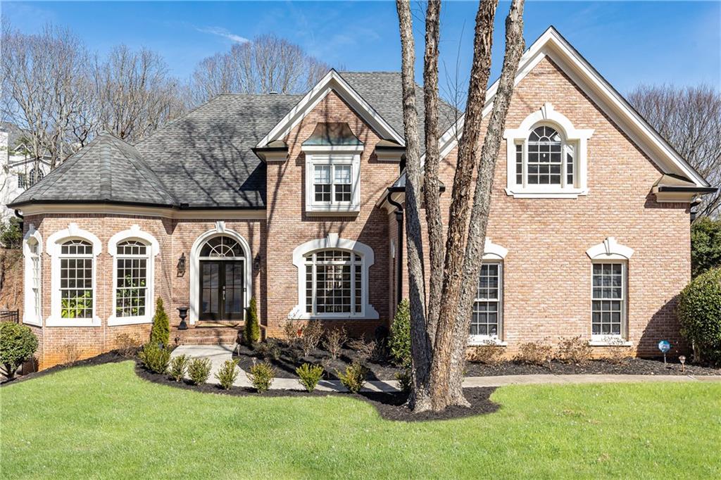Sought after 6 Bed/4 Full Baths and 2 Half Baths home for rent in Nesbit Lakes for $7,500/month. This renovated 3 story Single-Family Home features 6790 Sq Ft, with a 3 car garage, an open floor plan and master on the main. Large white kitchen with stone countertops, glass backsplash and new appliances. Kitchen opens to family room with 2 story stacked stone fireplace and vaulted ceilings. Master on main with huge walk-in shower and 2 walk-in closets. Upper level features 4 large bedrooms with 2 renovated bathrooms. Fully finished terrace level with additional bedroom, full bathroom and furnished gym! Fenced in backyard perfect for entertaining and playing. Rent includes yard maintenance, so no need to mow the lawn. Beautiful Alpharetta neighborhood with 2 large lakes, active Swim/tennis, ALTA and USTA, playground, and clubhouse. All occupants over the age of 18 must submit a separate application, qualify, and appear on the lease agreement. Owner requires: a minimum 12 month lease, credit score of 700 or better, NO evictions, security deposit ($7,500) + 1st and last month's rent ($15,000) are due upon signed agreement. Tenant must have renters insurance and a liability insurance coverage minimum of $500k. Tenant pays all utilities. No sign on property. Two year lease for $7,400/month for the first year and $7,500/month for the second year. Terrace level carpet to replaced with new flooring in a few weeks.