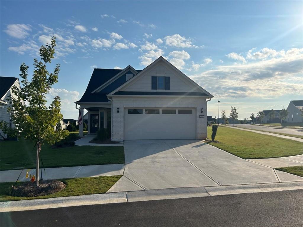 Stunning 3BR / 3BA in Del Webb Chateau Elan – 55+ Resort-Style Living. Why wait for new construction when you can move right into this like-new, highly upgraded home in the sought-after Del Webb Chateau Elan community? Perfectly positioned on a corner lot, this 3-bedroom, 3-bath beauty combines modern elegance with thoughtful design, offering both comfort and convenience. Step inside to find an inviting open layout filled with natural light, designer finishes, and custom touches throughout. The chef’s kitchen shines with upgraded cabinetry, farmhouse sink, and premium Whirlpool appliances—perfect for entertaining or everyday living. The spacious owner’s suite is a retreat of its own, featuring a coffered ceiling, accent wall, and spa-like bath with upgraded mirrors, tile shower, and added natural light. Upstairs, guests will enjoy a private suite with bedroom, full bath, and living space. Throughout the home you’ll find luxury vinyl plank flooring, upgraded lighting, and five ceiling fans for year-round comfort.
The outdoor living space is a true highlight. Relax on the screened back porch complete with ceiling fan, heater, and TV mount, or step out onto the extended concrete pad—ideal for grilling and gatherings. The garage is a dream, with an epoxy-sealed floor, extension for extra space, and walk-up lighted overhead storage. All of this comes with the unmatched amenities of Del Webb Chateau Elan—resort-style clubhouse, pools, fitness center, tennis, pickleball, and endless opportunities to connect with neighbors in this vibrant 55+ community. This is the rare chance to have it all—new construction feel, custom upgrades, and immediate move-in. Welcome home!