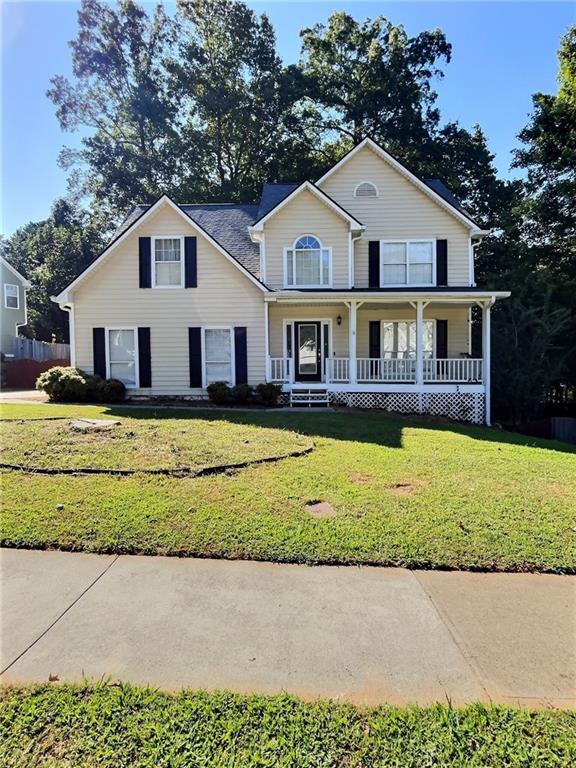 Welcome to your new home in Collins Hill School District. This home combines space, comfort and flexibility. Whether you need room for family, entertaining, or extended family living, the terrace level suite adds a lot of value and versatility. The finishes and recent updates make it easy to just unpack-ready to move into! Home features a two-story foyer, hardwood and tile floors on main. Large kitchen with plenty of counter space and spacious cabinets. Separate dining room open to a front formal/office/flex room. A cozy fireplace in a spacious family room. Walk outside into the screened in porch overlooking a private fenced backyard. Huge master bedroom with sitting room with his/hers walk in closets. Finished terrace level with hardwood floors and in-law/teen suite with kitchen and 5th bedroom with full bathroom.
The neighborhood offers both tranquility and convenience: close to shopping, highways and everything Lawrenceville has to offer! This one won't last long!