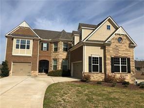 The Magnolia plan w/Basement! features 5 bedrooms, 4 full baths, large dining room, kitchen w/ hidden walk-in pantry, breakfast room, great room, keeping room/sunroom, 12' x 22' Oversized Deck. Granite countertops, all stainless appliances, hardwood floors throughout first floor exc bedroom, bedroom and full bath on the main floor, master sitting room upstairs with fireplace, all secondary bedrooms are en-suite with walk in closets! Built in Cabinetry, 3 Car Garage, Incredible Forsyth County School District!