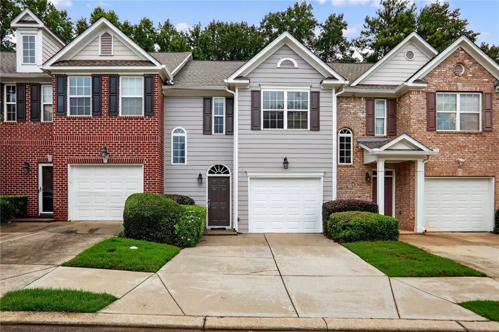 Beautiful, gated community surrounded by east Atlanta's favorite neighborhoods! This freshly painted 3 bedroom, 2.5 bath townhome features an open main level with a ventless electric fireplace, half bath, and double sliding glass doors to a rear patio with a storage closet. Your 1-car garage provides direct access to the kitchen, which offers a pantry, recessed lighting, electric stove, and a breakfast bar. Upstairs, you will find the master suite, which offers a spacious double vanity with a separate tub/shower, along with two additional bedrooms and hall bathroom. The laundry is centrally located on the second floor. Highlight of the community is the refreshing and relaxing salt water pool! The kids have their very own splash pad and playground too, which are both located just around the corner. Enjoy lock-and-go convenience so you can spend more time enjoying your favorite restaurants, shops and easy access to the BeltLine, Downtown Atlanta, Decatur, EAV, East Lake & Kirkwood. Great for owner-occupants or investors looking for a well-managed community with strong reserves.