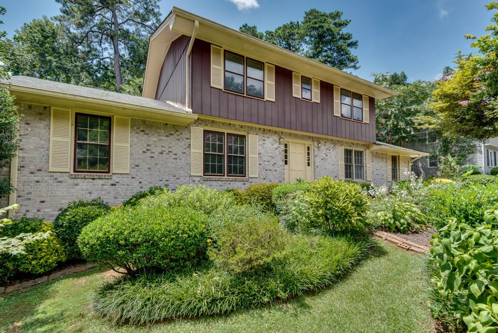 Fantastic opportunity to get into a large home on a wonderful lot and neighborhood in Briarlake/Lakeside! The potential of this truly well-maintained home is limitless. Brand new carpet and fresh paint throughout where you can move right in. Or make select improvements over time to the classic floorplan that already has an open kitchen, two large living spaces, a huge owner's suite with walk-in closet, and recently refreshed bathrooms. Or this classic neighborhood will support a high-end full renovation now, including the sprawling basement with tall ceilings. And that's all before you step outside to the private deck and grassy backyard or use the new driveway and two car garage with ample storage. Conveniently located close to neighborhood pocket parks and swim/tennis, near restaurants, shopping, Emory, CDC, and so much more!