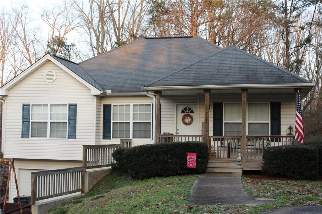 No subdivision here! Ranch on a basement with 4 bedrooms and 3 full baths all on over an acre. 3/2 on main with a bedroom (Flex room) and full bath on basement level. Beautiful new hardwoods throughout. Large extended deck, great for entertaining. Possible 100% financing!!