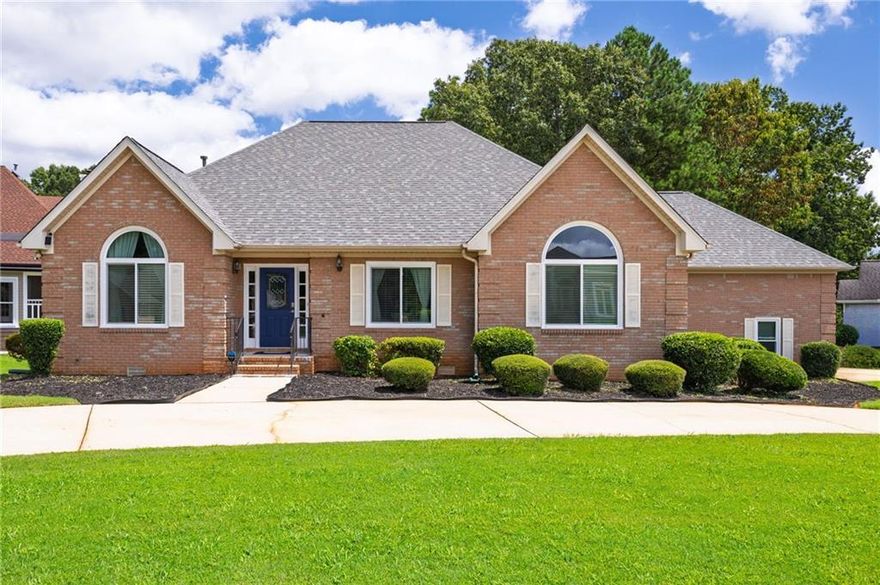 This stunning and meticulously maintained 3-bedroom, 2.5-bathroom home is set on a generous 1/3-acre lot and features an inviting circular driveway, enhancing its curb appeal in a highly desirable community. This residence has been thoughtfully updated to provide modern comfort and style, showcasing a brand-new roof that promises durability, new efficient windows that offer plenty of natural light, and luxurious vinyl plank (LVP) flooring throughout the main living areas for a seamless flow.
     Inside, the home features an array of contemporary fixtures and ceiling fans, contributing to a fresh and airy atmosphere. The interior has been freshly painted in cool, neutral tones, making it easy for potential homeowners to add their personal touch. The heart of the home is the spacious kitchen, complete with a new sink and all appliances included, which is perfect for culinary enthusiasts.
     The master suite is conveniently located on the main level, providing a private retreat complete with en-suite bathroom amenities for added convenience. And an office space ideal for remote work or study. Upstairs is a well-appointed Jack and Jill bathroom that serves the two additional bedrooms, making it perfect for families. 
     A highlight of this property is the expansive sunroom that overlooks a serene and private backyard, creating a perfect setting for relaxation or entertaining guests on the exterior deck. The outdoor space is enhanced by the side-entry garage that offers additional privacy and curb appeal, and the home is made with durable brick on all four sides, ensuring low maintenance and timeless aesthetics.
     Residents of this welcoming community have access to a variety of amenities, including a swimming pool, tennis courts, a playground, and well-maintained area sidewalks illuminated by streetlights for evening strolls. The location also offers close proximity to shopping centers and reputable schools, making it an ideal choice for families and individuals alike. This home truly embodies comfort, style, and community living—a perfect place to create lasting memories. **SELLER CONCESSIONS $5,000**