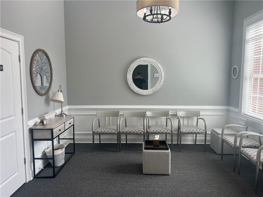 Beautifully renovated office condo minutes from downtown Woodstock. Four executive size offices, lobby, bathroom and break.