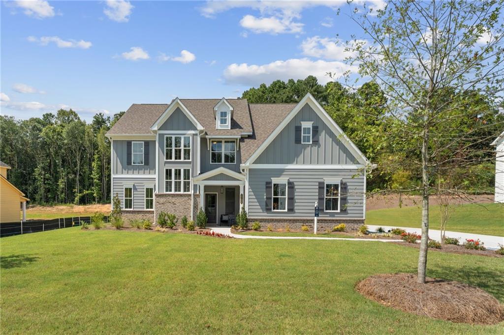 Traton Homes Bramblewood C – READY NOW! This impressive 3,300-square-foot home, situated on an estate-style lot in the sought-after Hillgrove High School district, features 5 bedrooms, 4.5 bathrooms, and a spacious three-car side-entry garage. Nestled in a boutique-style community this home offers the perfect blend of elegance and modern comfort.
Designed with modern living in mind, the main floor boasts an open-concept layout filled with natural light from its numerous windows. The well-appointed kitchen, complete with stainless steel appliances and a generous island, flows effortlessly into the living and dining areas, making it perfect for entertaining family and friends. Upstairs, an additional living space offers versatility, whether you need a family room, playroom, or media area. The large owner’s suite is a luxurious retreat, featuring an oversized walk-in shower, double sinks, and a spacious walk-in closet. Three more bedrooms provide ample closet space, ensuring comfort and convenience for all.
Home is READY NOW! Please see sales agent for special buy down incentive! All applicants must prequalify with our lender regardless of who they choose for their loan. All incentives are tied to the preferred lender only.
Please use address: 2218 W Sandtown Rd SW, Marietta, GA 30064