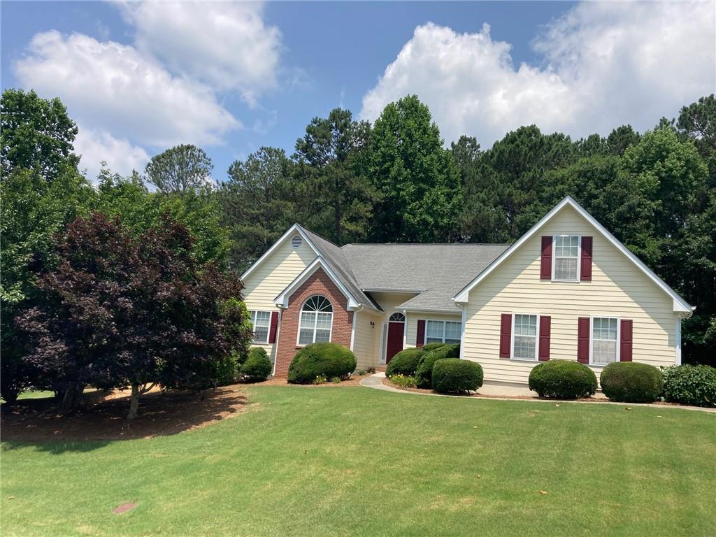 Great 3bd/2ba home in sought-after Grayson neighborhood. Finished bonus room over garage that can be 4th bedroom. Open floor plan, vaulted and trey ceilings through-out home. Beautiful wooded back yard. Lots of architectural upgrades. Needs some cosmetic updating, but in great shape. Buy at this price and have instant equity.