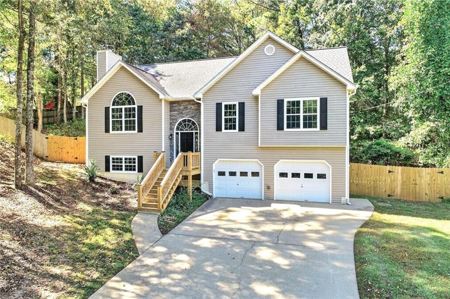 Open on Sunday from 12-2pm! Move-in ready and full of updates, this bright, open home is perfect for everyday living and entertaining! Enjoy brand-new flooring and paint throughout, updated bathrooms, new windows, lighting fixtures, gutters, and spacious new front and back decks. The finished basement includes a 4th bedroom, full bath, and flexible bonus room—ideal for guests, extended family, or a home office. An oversized garage and long, level driveway provide plenty of parking and storage.

Tucked away on a quiet cul-de-sac with no homes across the street, you’ll appreciate the peaceful privacy this setting offers. Conveniently located less than 2 miles from the upcoming Downtown Holly Springs development—a vibrant new destination for dining, shopping, greenspace, and community events expected to open in 2027—this home combines quiet living with exciting future amenities just minutes away!