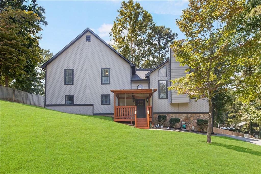 WOW- This home is HUGE!! Perfect for the growing family or great for investors with NO hoa restrictions!! Located in desriable East Paulding, this property offers incredible space and flexibility. The Large, open fireside family room flows into separate dining room and kitchen with abundant counter space, making entertianing a breeze. The oversized master suite features a sitting area, master bath has separate soaking tub and shower with double vanity, spacious master closet, secondary bedrooms next to the master with double vanity bathroom to share, huge bonus/game room perfect for kids play area, movie room or work from home office, step outside to a fenced backyard in culdesac ideal for gatherings or relaxing evenings. Recent updates include new roof, new covered deck and front porch, this home has many features ready for the next homeowner!!