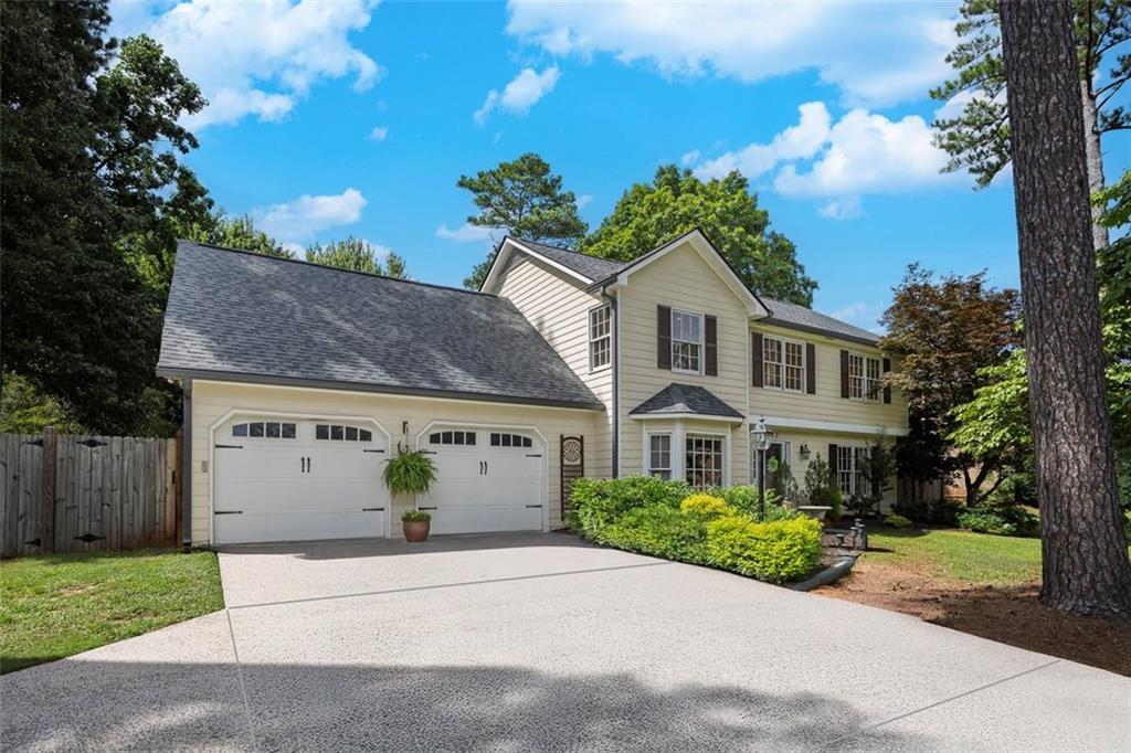 Welcome home to 3043 Greyfield Place. This is a rare opportunity to purchase in the sought-after neighborhood of Greyfield! This 4 bedroom, 2.5 bathroom home has a custom-built, oversized primary suite that was expanded into the area above the garage, complete with a secondary, private stairway & en suite bathroom & separate sitting room! Newer roof, gutters & tankless water heater. Wood floors throughout. The main level includes a separate dining room, breakfast nook off of the kitchen, office & living room. The updated kitchen includes stainless steel appliances (with a double oven) & a one-of-a-kind walk-in pantry. The upstairs split-bedroom plan provides just the right amount of privacy for the primary suite. Outside you will find a fully fenced (newer construction) yard, patio & an extended covered stone patio. Conveniently located less than 2 miles from shopping (Kroger, Publix, etc), restaurants, LA Fitness, Terrell Mill Park (4 baseball fields, multisport field & 8 tennis courts) & the I-75 Express Lane on-ramp. App. 1/2 miles from Brumby ES & East Cobb MS with continuous sidewalks from the neighborhood to both schools & Terrell Mill Park. Greystone is an OPTIONAL HOA neighborhood. Please be sure to check out the virtual tour!
