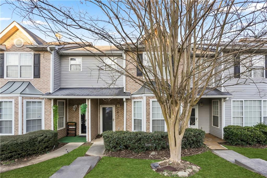 Beautiful remodeled 3-Bedroom, 2-Bath Townhome. Seller will contribute upto $5000 for buyer to utilize for interest rate buy down or towards their closing cost with acceptable offer.This home offers modern comfort and style. The main level showcases new vinyl plank flooring, while the upper level features recently installed carpeting. The entire interior has been freshly painted and enhanced with updated lighting fixtures for a bright feel. The kitchen is both functional and inviting, featuring stainless steel appliances-including a new Samsung French door refrigerator, dishwasher, and microwave. A convenient bar area comfortably seats four, perfect for casual dining or entertaining. Step outside to enjoy the back deck overlooking a two-car parking pad. Ideally located near Pine Street Elementary School and Piedmont Medical Center, this home offers both comfort and convenience. Special Financing Offer: When you finance your new home with Preferred Lender Shelly Efil of SAT Lending, you'll receive a FREE appraisal. Buyers may also qualify for 100% FHA Financing-making homeownership more accessible than ever.