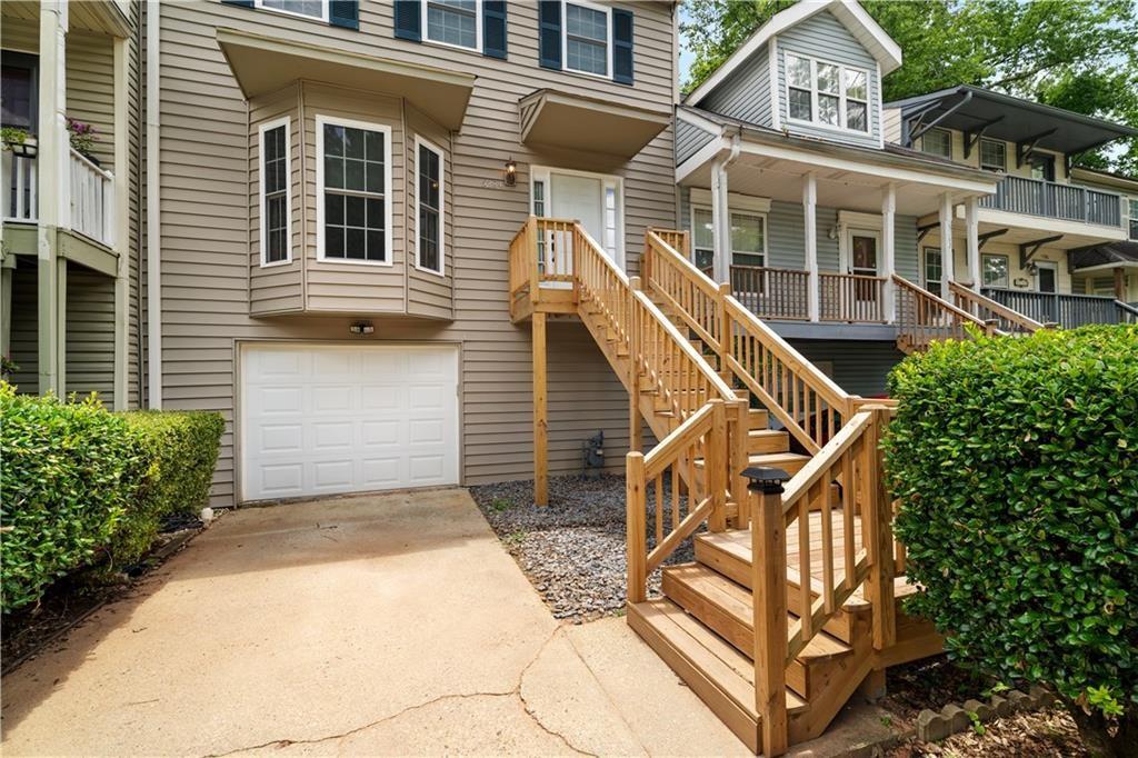 Welcome to 5284 Afton Way, a well-maintained 2-bedroom, 2.5-bath townhouse available for lease in the highly sought-after Afton Downs community. Ideally located just minutes from Truist Park and The Battery, this home offers easy access to parks, shopping, dining, and major highways including I-75 and I-285—perfect for commuters and those who love being close to the action. The main level features a spacious living area, a convenient half bathroom, and access to a private back deck that’s perfect for relaxing or entertaining. Upstairs, the home boasts a great roommate-style layout with two large bedrooms, each with its own ensuite bathroom for maximum comfort and privacy. An attached garage offers secure parking and also serves as a great space for extra storage. This is a fantastic opportunity to lease a comfortable, well-located home in one of Smyrna’s most convenient neighborhoods. Schedule your tour today!