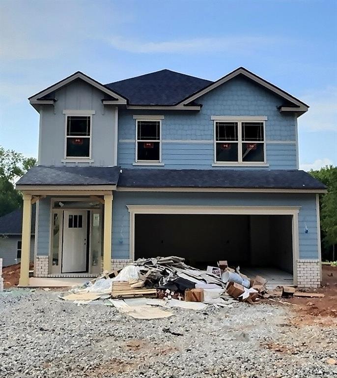 Last Corner Lot Master On Main! Charming 5-Bedroom 3.5 bath home in the most sought out subdivision in Cornelia, Ga! Nestled in the middle of this peaceful neighborhood, this 2,709 sq. ft. residence perfectly blends style, comfort, and modern conveniences. Welcome to 285 Magnolia Villas Drive (Lot 86) boasting 5 spacious bedrooms and 3.5 baths and a bonus loft! This property offers everything you need for comfortable living and entertaining. Open concept kitchen/family room has white hardwood soft-close cabinetry, a large attention-grabbing kitchen island upgraded with charcoal black cabinetry and covered in sleek granite with ample recessed lighting, a deep bowl stainless steel sink with brushed nickel finishes, and a cozy breakfast room makes this space a chef's delight. The primary suite features a large shower with large walk-in closet and spacious room to truly unwind. Upstairs loft area is pre-wired for a ceiling fan, phone, and TV, the loft offers endless possibilities for use as a family room, office, or play area. Laundry room adds convenience and elegance located in the center of all bedrooms on the second floor, so no hauling laundry! Enjoy the covered lanai, with ceiling fan and prewired for TV, making it the perfect spot for relaxing or hosting a tailgate with our game day package. This home truly stands out with thoughtful upgrades and a prime location near local amenities. Don't miss your chance to live in this stunning property. Secure your purchase, and secure your peace, with our top-of-the-line warranty! 1 Yr. Builder's Warranty, 2 Yr. Systems Warranty, 10 Yr. Structural Warranty, 2 Pre-Closing Walk Throughs & a Smart Home Switch Package.
*stock photos provided are just for visual purposes and does not reflect actual colors, finishes to be determined in home.