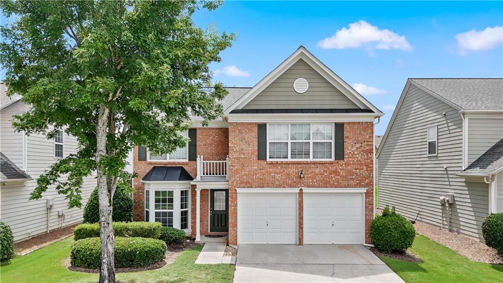 Step into style, comfort, and convenience — this beautifully updated former model home is move-in ready and full of upgrades!
Perfectly positioned on a large, flat, and meticulously landscaped lot, this east-facing gem stands out with premium builder options like elegant staircase railings and a full-yard sprinkler system—just one of many thoughtful touches.
Recently repainted from top to bottom, including the garage, doors, and baseboards, the home has a fresh, modern feel complemented by new designer light fixtures throughout.
The soaring two-story foyer welcomes you into a bright and airy living space that flows effortlessly into the casual dining area and updated kitchen. The chef-inspired kitchen is equipped with quartz countertops, a pantry, a like-new dishwasher and disposal, a vented microwave, and a gas range and oven—ideal for both everyday living and entertaining. A formal dining room with a charming bay window offers the perfect setting for hosting dinners and holiday gatherings.
Downstairs, you’ll find rich hardwood flooring, a spacious laundry room with washer and dryer included, a guest powder room, and extra storage for added convenience.
Upstairs, a cozy loft leads to the expansive primary suite, featuring three oversized windows, a large en-suite bathroom, and a generous walk-in closet. All bedrooms are equipped with ceiling fans and light fixtures, with tile in all bathrooms and plush carpet in the bedrooms.
? Recent upgrades include:
New Roof (2016)
New HVAC System (2021)
Fresh Full Interior Paint (2025)
New Water Heater
Updated Kitchen Appliances & Fixtures
New Light Fixtures Throughout
Located in one of Forsyth County’s top-rated school districts, this home offers unmatched accessibility—just minutes to McGinnis Ferry, GA-400, and I-85. You'll be close to shopping, dining, and entertainment, and only moments from premier soccer fields managed by United Futbol Academy.
The community itself is packed with amenities, including an Olympic-sized swimming pool, four tennis courts, and beautifully maintained common areas. With no rental restrictions, it’s also a fantastic opportunity for investors. Both neighborhood entrances are monitored by security cameras, and the school bus stop is just steps away—perfect for families.
This home truly has it all—style, location, and smart upgrades. Schedule your showing today and fall in love the moment you walk in!