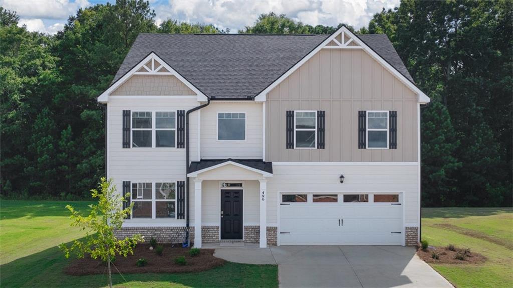 Seller paid closing cost with preferred lender. Barrow county's newest premiere community features, a pool, tennis and pickle ball courts, walking trails, playground, and a clubhouse with serving kitchen and gathering room. Preserve at Dove Creek is a 100% USDA FINANCING qualified neighborhood. THE PACKARD FLOOR PLAN HAS 4 BEDROOMS, 2.5 BATHS. It offers a traditional layout with formal living & dining room, spacious open concept design family room with a cozy fireplace open to the kitchen with quartz counter-top, backsplash, luxury vinyl floors entire main level. There is a lovely rear covered porch to enjoy your morning coffee or a nice sunset dinner. On the second level, 4 large spacious bedrooms. The owner's suite is oversized and complimented with a large owner's bathroom suite showing off dual vanities, Soaking tub & shower, and large walk-in closet. 3 generous secondary bedrooms with nice closets and a laundry room is also upstairs. Preserve at Dove Creek is located just 10 minutes from FORT YARGO STATE PARK and 20 minutes from ATHENS GA. We are located within 2.5 miles from 316, with easy access to the city and surrounding suburbs. ALL Homes are equipped with a Smart Home System; Lawns have designed 3 Zoned Sprinklers Systems. SPECIAL BUYER'S INCENTIVES. CONTRACTS WRITTEN AND SUBMITTED ON BUILDER FORMS ONLY * Prices and promotions are subject to change at any time, and this listing although believed to be accurate, may not reflect the latest changes.