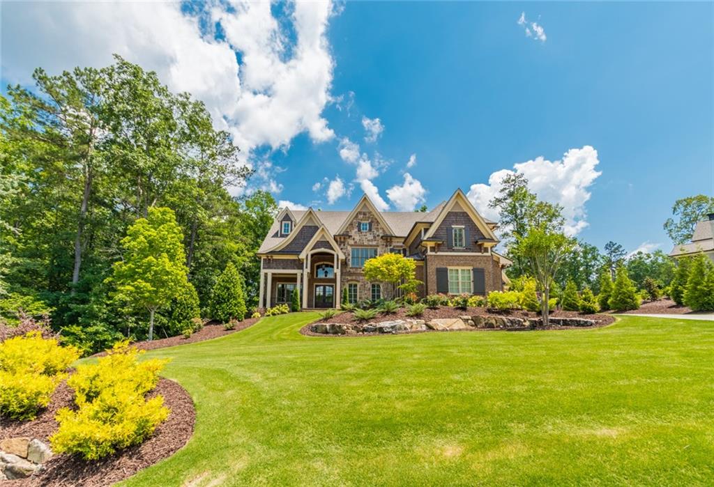 Unbelievable Custom Home recently constructed w/stunning Golf Course Views in The Manor. Superior Craftsmanship & Interior Decor. Impressive 2 Story Foyer, Paneled Study, Elegant DR/LR, Butlers pantry, Solid wood trim & Crown Molding thruout, Stunning Marble counters in Gourmet Kit & lg islnd, High End Appls, walk-in pantry, Huge keeping rm w/stone f/p, Hdwd flrs thuout, Elevator Shaft, Impressive owners ste w/fp,Heated flrs in BA, Lg Media rm w/wet bar & balcony, Guest ste on main, 2 laundry rms, Mud rm, Flag Stone Patio w/heated Pebble-Tec Pool & Spa! 4 Car Garage!