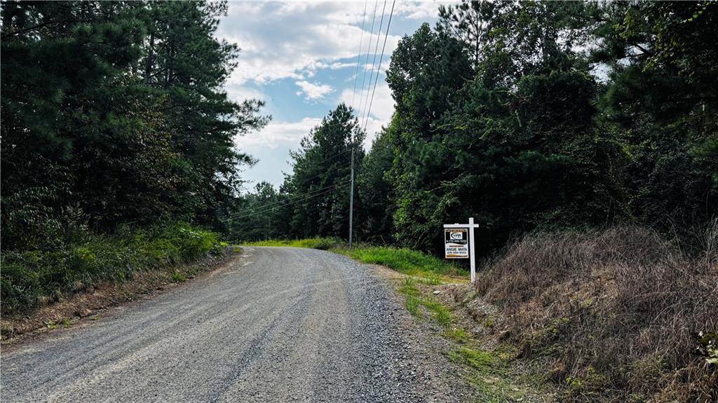 Beautiful property reserved for a nature lover. The property has it all, it has the privacy, the land size, the views, a cleared area for your new home (If that's what you want the property for), wooded acres with trails throughout to enjoy nature, hunting, ATV riding, horseback riding, you name it... We built a very nice (permitted - 25' x 40') Pavillion to go hunting, RV camping, and outdoor family activities. The Pavilion is built out mostly of cedar wood, with full electricity installation. It has (120V outlets throughout as well as 240v outlets, lighting and ceiling fans), covered by a metal roof. As it stands, the pavilion can be used for outdoor family gathering activities, camping, or for endless uses once you build your dream home right next to it. It was built on the highest location of the property, where you have the most beautiful views and the most desirable spot to build a home. The power is already there; it was ran underground from the street (no overhead wiring to worry about). The transformer pedestal in place was requested to be big enough to run the construction of a 6000+ sq. home and pavilion. Therefore, if you want the property to build, that part of the homework has been taken care of. There is small creek at the bottom of the property of the property, where there is a flow of water regardless of the time of the season. There are two storage containers on the property that are being sold with the property, where you can store all your outdoor toys (dirt bikes, SXS, ATVS, camping & hunting items, tools, etc..., ). This property is definitely worth the trip to go and see!
