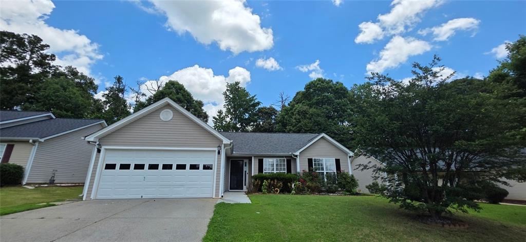 Beautiful One-Story Ranch Home Near Downtown Lawrenceville. Come enjoy this beautifully maintained one-story ranch home, ideally located just minutes from downtown Lawrenceville! This charming residence features gleaming hardwood floors and elegant granite finishes throughout. The updated kitchen boasts granite countertops, ample cabinet space, and a modern layout that opens seamlessly into the living and dining areas; perfect for cooking, entertaining, or family gatherings. Enjoy privacy and relaxation in the fully fenced backyard, ideal for outdoor living. Conveniently located near shopping, dining, and entertainment, with easy access to Hwy 316. Don’t miss your chance to own this stylish and comfortable home in a highly desirable location! Lawn care included!