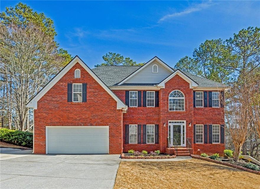 Welcome to this gorgeously updated, estate-style home featuring a furnished 1bdr/1.5ba apartment! Clean as a whistle and located in the amazing community of Alexander Farms, Marietta. This 6 bedroom, 5.5 bath, well-thought-out property offers an incredible opportunity for multi-level living for families looking to have different generations all living under one roof. SYSTEMS: Roof 4YRS, H2O 2MOS, HVACS 9YRS & 6YRS. These sellers have done extensive updates to this property along with a ton of sweat equity, please ask to see the list of improvements. Almost everything in this home has been touched! From the minute you step into the two-story foyer you'll know you've entered someplace very special. All the formal areas you would expect plus the conveniences that such a large property can offer. A lovely, well-appointed kitchen with a walk-in pantry and a new quartz island with extra seating makes the perfect breakfast area. For entertaining, the kitchen flows seamlessly to the living room and back deck, with both covered and uncovered areas, that overlooks a huge, fenced backyard. Plenty of yard space for all of your outdoor activities. This home truly offers everything you could want. There are so many different places to hang out - an in-home gym, separate office (or two), play area and did we mention the apartment on the terrace level? With both interior and exterior access you can use this as you see fit. Makes for a great teen hang-out spot: away from the adults but still at home. If you need a fully functioning in-law suite this apartment has a beautiful kitchen with half bath, washer/dryer hookups, an open seating area, and a large bedroom with an en suite full bath. It's been very nicely finished to feel like the rest of the house. For added convenience, a guest bedroom (currently used as an office) and bath are in a secluded part of the main level, providing privacy and comfort for visitors. Upstairs, the ENORMOUS primary suite features a separate seating area, two large walk-in closets, and a roomy bathroom with dual vanities, glass-framed shower, and jetted soaking tub. 3 additional bedrooms share a Jack-n-Jill bath. From the top of the stairs you have a pretty view over the 2-story foyer and huge windows looking out front. The main laundry with fun new tile flooring is also on the upper level - where the closets are! This entire floor and the bedroom on the terrace level have new carpeting. HARDWOODS THOUGHOUT MAIN LEVEL. Plenty of off-street parking with two garage spaces and an extended driveway on the left side of the garage with 2 more spaces. Alexander Farms is known for its comprehensive amenities package - playground, tennis courts, swimming pool and clubhouse (with catering kitchen), plus a soccer field! With it's close proximity to shopping and dining, and in one of Marietta's top school districts, the move to Alexander Farms is an easy decision!