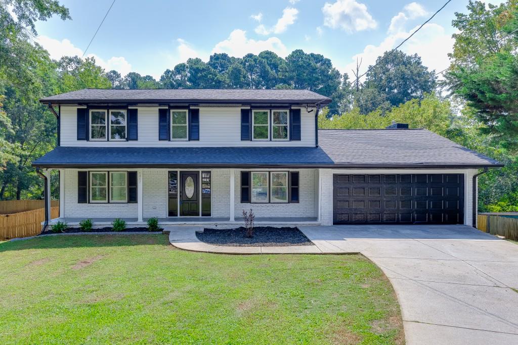Better than new FULLY remodeled home in the highly rated Briarlake Elementary and Lakeside High School school district. Prime Decatur location close to shopping, dining, 285 and 85. Situated at the end of a quiet cul-de-sac street on over half an acre in the lovely Ramble Woods community. This charming home with a welcoming covered front porch has been completely renovated from the brand new roof down to the finished basement. New light fixtures, new appliances, new paint, new HVAC, new privacy fence, new LVP on all 3 levels and four completely renovated full baths! The main level has been opened up to allow for great entertaining and flex spaces. There are two dining areas- one formal dining and one informal breakfast room, two living areas- one family room and one living room. The kitchen has all new appliances, quartz countertops, pull-outs in the pantry, a one level island and a window that overlooks the backyard. The kitchen has a view to the family room outfitted with a linear fireplace flanked by built in shelves. Access the massive back deck from slider doors in either the family room or breakfast room. Upstairs is the primary suite with a spa-like bath retreat with oversized tile accent walls, a soaking tub, dual sink vanity and separate shower with a rain head and hand held sprayer for easy cleaning- during and after your shower. Oversized walk in primary closet. Upstairs two additional bedrooms and another spa like bath with a rainhead and hand held sprayer. The laundry room rounds out the upper level. The finished daylight basement has multiple flex spaces- a home theater, man cave, gym, office, kid's rec room- the possibilities are endless! The bedroom has hall access to a full bath accessible from all spaces. There are several storage closets and an additional unfinished storage space/mechanical room with a painted floor- no concrete dust will come from the unfinished area into the finished spaces. The back yard can be accessed from the basement through a door that leads to poured concrete below the deck and a large, level back yard that has both a new privacy fence and a heavily wooded tree line beyond the fence. The perfect yard for adults and kids alike. Great for entertaining on the deck that spans the back of the house- room for a grill, a smoker or a future outdoor kitchen and the grassed yard is perfect for kids running around, adults playing corn hole on Saturdays during football season or a firepit for cooler evenings. It is a great blank canvas that can become your backyard oasis! Don't miss this opportunity to have a MOVE-IN READY updated dream house in one of the most sought after areas of Atlanta Decatur!