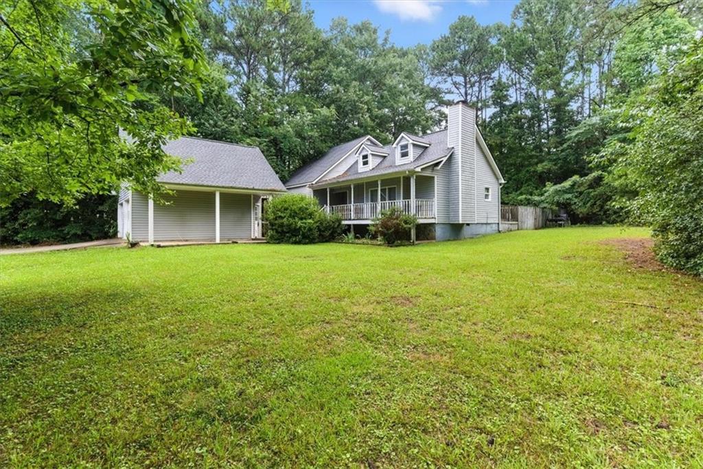 Looking for your next project? Charming 3-Bedroom Home with Endless Potential!
This spacious 3-bedroom, 2-bath home offers 1,976 sq ft of opportunity and character! From the welcoming, rocking-chair front porch to the sunroom overlooking the fully fenced backyard, you'll find charming details around every corner. Inside, gleaming hardwood floors flow through the main living areas, creating a warm and inviting atmosphere.
Enjoy an open-concept kitchen and dining area—ideal for entertaining—and a functional layout ready for your personal touch. The generously sized master suite is privately situated on the upper level and boasts a spa-like retreat with a whirlpool jetted tub, walk-in shower with bench seating, and plenty of space to create your dream bathroom oasis.
Additional features include: Bright and open living spaces, Sunroom with backyard views, Detached 2-car garage with an upstairs bonus room and private entrance—great for a studio, guest suite, or home office.
Major updates already completed: HVAC replaced in February 2015, Roof replaced in January 2020, Water heater replaced in October 2024
Whether you're looking to renovate for resale or settle into a home full of charm and potential, this fixer-upper is a fantastic canvas to bring your vision to life!
Home is currently in Probate and will need the contract signed off by a Judge. Sold As is.