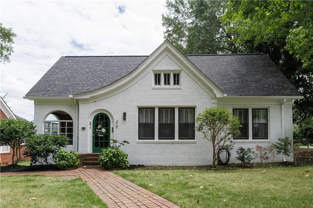 This charming 1900-built beauty offers the perfect blend of historic character and modern updates. With 3 bedrooms and 2 updated bathrooms on the main floor, plus over 3,000 heated square feet, there’s room to grow—the upstairs offers potential for 3 additional bedrooms or 2 bedrooms and a full bath!
Highlights include:
• Brand new roof (installed in April)
• Detached oversized garage with private back entrance (New door installed in May)
• Ventless gas logs for cozy evenings
• Updated bathrooms
• Great curb appeal
• Shared front driveway with a completely private rear access
Situated in the heart of downtown Rockmart, you’re just:
• 15 minutes to Dallas
• 30 minutes to Rome & Cartersville
• 45 minutes to Kennesaw
Offered as-is, this home is packed with opportunity in the heart of Rockmart’s walkable, historic downtown. Whether you’re looking for a primary residence, investment opportunity, or a spacious renovation project—this one is full of potential!