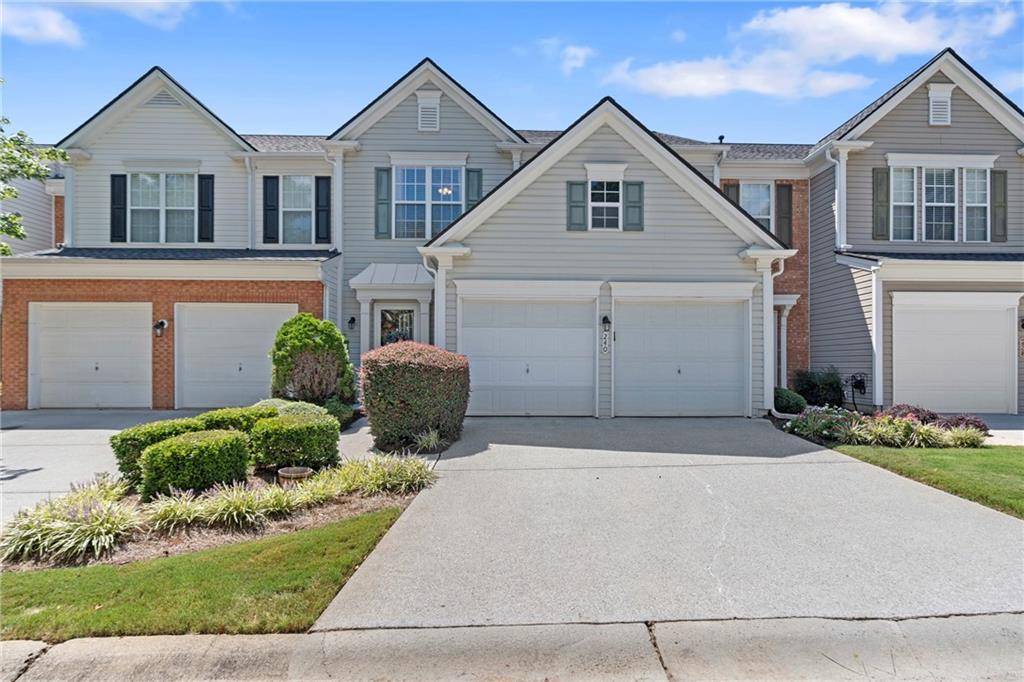 Welcome to this beautifully maintained townhome in Woodstock’s desirable Regent Square community. Built in 2003 and offering nearly 1,800 square feet of living space, this move-in ready home combines thoughtful upgrades with everyday comfort. The open-concept main level showcases gleaming hardwood floors, a spacious family room anchored by a cozy gas fireplace, and a bright kitchen featuring a brand-new refrigerator, stainless steel appliances just three years old, and plenty of storage and prep space. A convenient half bath on the main floor adds functionality, while the adorable under-the-stairs play nook creates a unique feature kids will love. Upstairs, the owner’s suite is a true retreat with an upgraded bathroom that includes a tiled shower, raised double vanity with space for a makeup area, and a large walk-in closet. The laundry room is also conveniently located upstairs along with additional well-sized bedrooms. Throughout the home, newer interior paint provides a fresh, modern feel, while the roof, only five years old, ensures peace of mind for years to come.The fenced backyard offers a private outdoor escape perfect for pets, play, or relaxing evenings, and the spacious two-car garage provides excellent storage options. Just steps away, you’ll soon find Woodstock’s largest and newest amenity coming soon—**Little River Park**. Spanning more than 100 acres, this master-planned recreational hub will feature sports fields, multi-use courts, open play lawns, a large community pool complex, destination playgrounds with splash pads, and miles of walking and biking trails that connect through scenic woodlands. The park will also include picnic shelters, pavilions, event lawns for festivals, and nature-based play zones with woodland overlooks, making it the perfect place to gather, play, and enjoy the outdoors.
With its thoughtful updates, inviting layout, and prime location near shopping, schools, and Woodstock’s vibrant downtown, this home truly offers the perfect balance of comfort, convenience, and lifestyle.The sellers have loved how quiet and peaceful the neighborhood is, with the trees, the garden, and the beautiful natural lighting that fills the home. It feels like a quaint cottage, yet it’s still so close to everything you need. Just 10 minutes to Downtown Woodstock, minutes from Publix and local parks, and only 12 minutes to Trader Joe’s in Roswell, the location is incredibly central while still offering a sense of retreat.