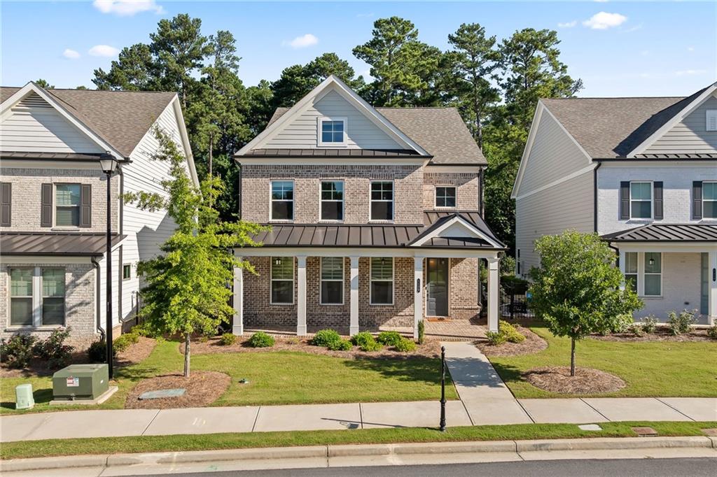 Welcome to this thoughtfully designed home that blends comfort, functionality, and style in one of Suwanee’s most desirable communities. Step into a spacious, open-concept layout featuring a bright and inviting foyer that flows seamlessly into the expansive family room, dining area, and chef-inspired kitchen. Perfect for entertaining, the kitchen showcases an oversized island with ample seating, stone countertops, and a clear view of the main living space.
A private guest bedroom and full bath on the main level offer ideal accommodations for visitors or a home office setup. Upstairs, retreat to the luxurious owner’s suite with dual walk-in closets, a spa-like bathroom featuring double vanities, and plenty of natural light. Two additional bedrooms are connected by a convenient Jack-and-Jill bathroom, making this layout perfect for families or roommates.
Enjoy resort-style living with exceptional community amenities, including a gated entrance, swimming pool, cabana, five charming pocket parks, and direct access to scenic county park trails—plus a private path leading to Peachtree Ridge Park.
Located within the highly sought-after Peachtree Ridge School District, this home offers not just beautiful interiors but also a top-tier lifestyle. You're only 3 miles from the vibrant Suwanee Town Center, known for its dining, shopping, festivals, and family-friendly atmosphere.
Don’t miss your chance to live in Ellington, where convenience meets elegance in the heart of Suwanee.