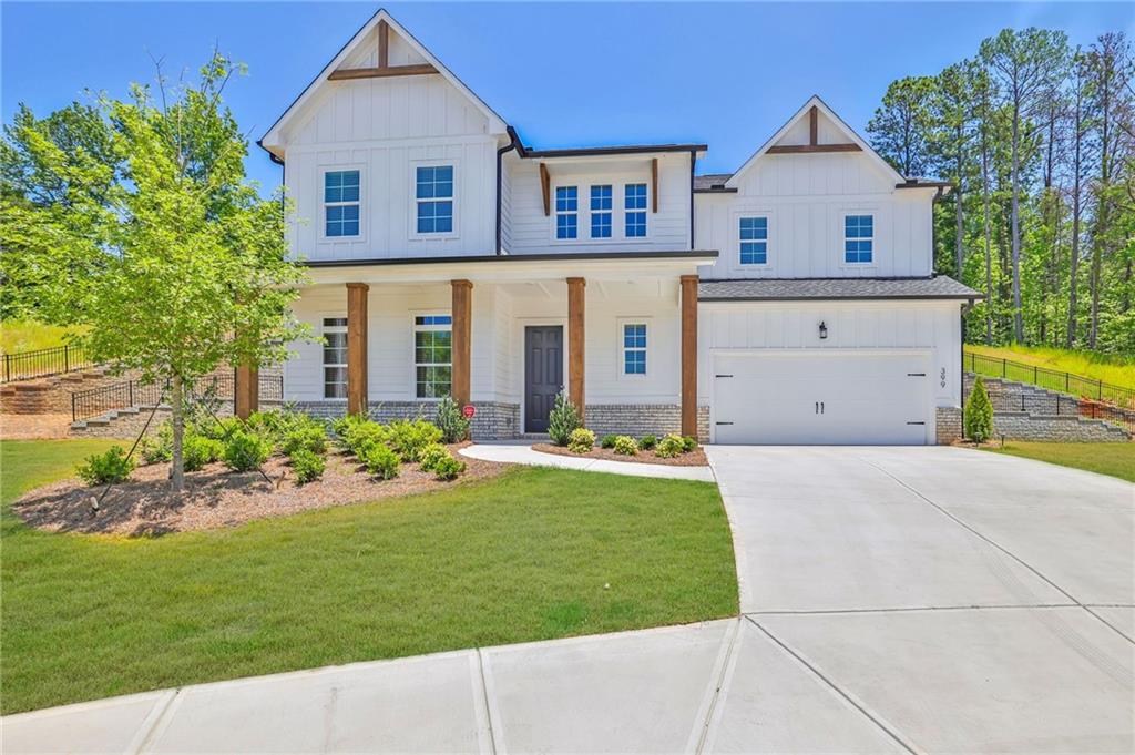 Welcome to your like new dream home perfectly situated between Woodstock & Milton!
This stunning "West facing" residence is nestled on a peaceful cul-de-sac with a rare & private backyard lot!
It offers the perfect blend of exceptional craftsmanship, modern living, resort style amenities, & a prime location.
Once you enter your grand 2-story foyer you’ll fall in love with the huge open concept design.
The flow from the dinning, family, & kitchen areas are ideal for relaxing together or entertaining.
The gourmet kitchen features an oversized island, soft close cabinets & drawers, a butler area with an enormous walk in pantry, a separate storage closet, & upgraded stainless steel appliances including a 5 burner gas stovetop.
Right off of the kitchen you can continue the enjoyment of entertaining by heading outdoors & onto your covered patio that provides complete privacy.
Back inside you have a bedroom, full bath, & powder bath on the main for an in-law suite or flex space.
All adorned with upgraded hardwood floors on the 1st floor & even on the stairs.
Upstairs the immense space continues with the large loft space, generous laundry room, the oversized owner suite, it's luxurious bathroom, & a giant walk-in closet!
All of this plus 3 more bedrooms & 2 more baths plus storage closets throughout the entire home.
This is your ideal home & neighborhood with sidewalks, a community pool, grilling stations, tables, corn hole, paddle ball tables, & a dog park area to utilize.
Top rated schools, 6 mins to Publix, 5 mins to Walmart, & under 5 miles from the vibrant & historic downtown Woodstock with shops, yoga, restaurants, & parks.
This is the one that has it all along with a transferable structural warranty to add peace of mind for years to come!