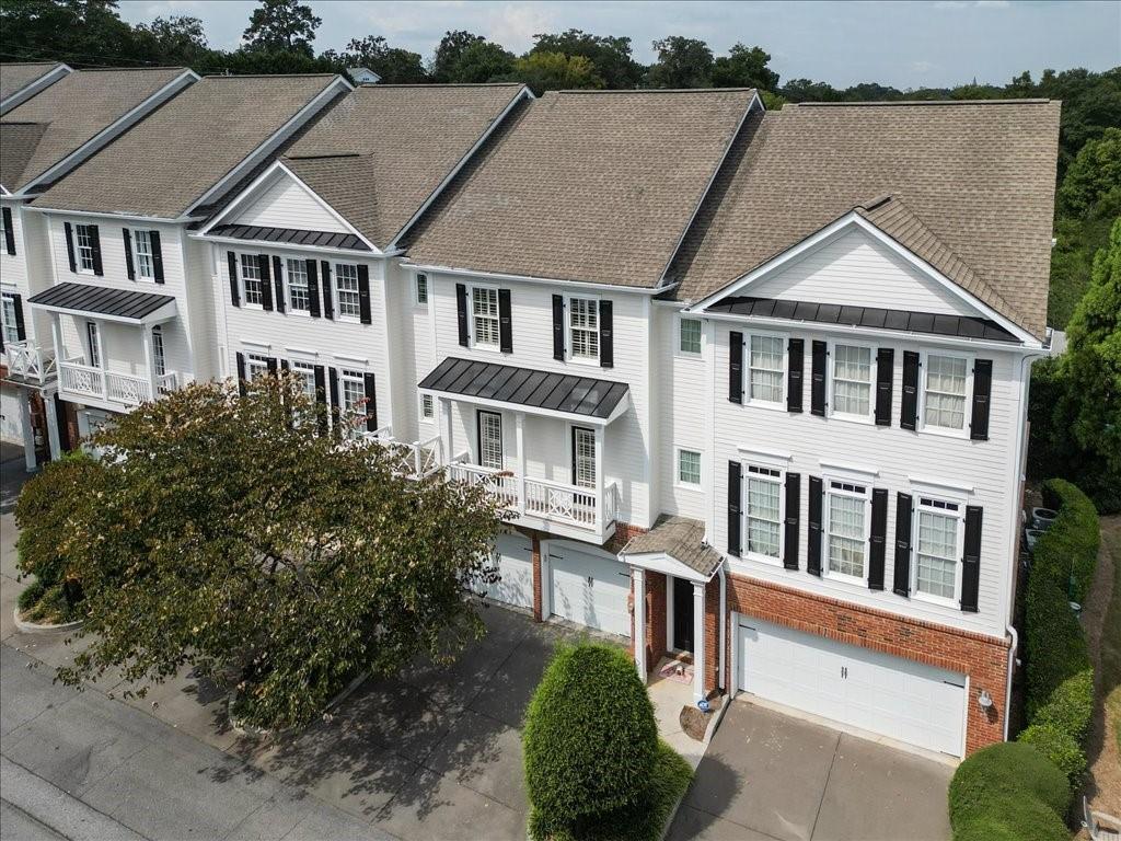 Nestled in an exclusive gated community just steps from Roswell Mill, this stylish 3-bedroom, 3.5-bath townhome offers the perfect blend of comfort and convenience. The light-filled main level features spacious living areas and a modern kitchen, while upstairs, the secondary bedrooms share a full hall bath. The finished basement includes a full bath and serves as both an entertainment space and a workout area, offering plenty of flexibility. An attached garage provides secure parking, and the location can’t be beat—just moments from acclaimed restaurants, boutique shopping, and vibrant local events, all within a quiet, beautifully maintained community.