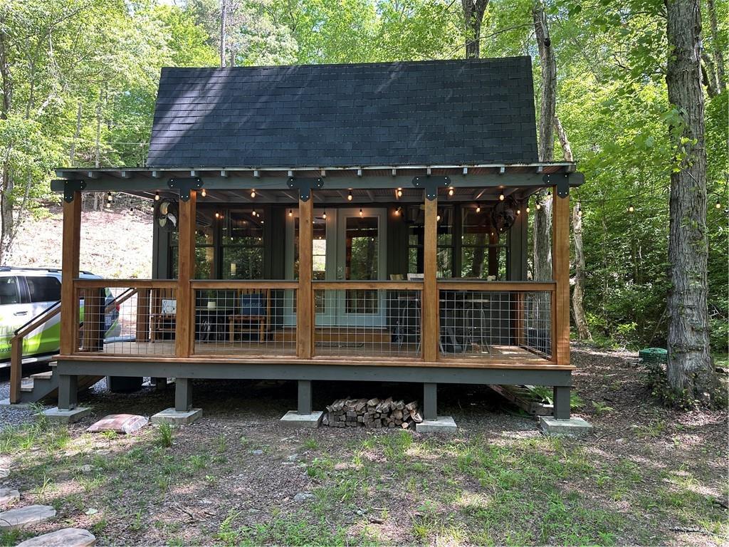 Claim your waterfront investment property on an Official Georgia Trout Stream. Just minutes from Blue Ridge, this Custom Cabin comes fully furnished and includes a Refrigerator, dishwasher, full-size Washer/Dryer, Bidet, bed and bed linens, window treatments, furniture, heated flooring, wall-mounted propane heater, two televisions, light fixtures, silverware, yard furniture, and a custom 400-pound fire pit. Brand new WELL that delivers 100 gallons of water per minute.
AirB&B property with 5 STAR RATING and "Super Host" Status..........
********OWNERS CHOOSE TO USE THIS CABIN AS A RETREAT FOR THEMSELVES. INVESTORS SHOULD KNOW THIS PROPERTY WOULD STAY OCCUPIED OTHERWISE. FINANCIALS AVAILABLE UPON REQUEST*********
