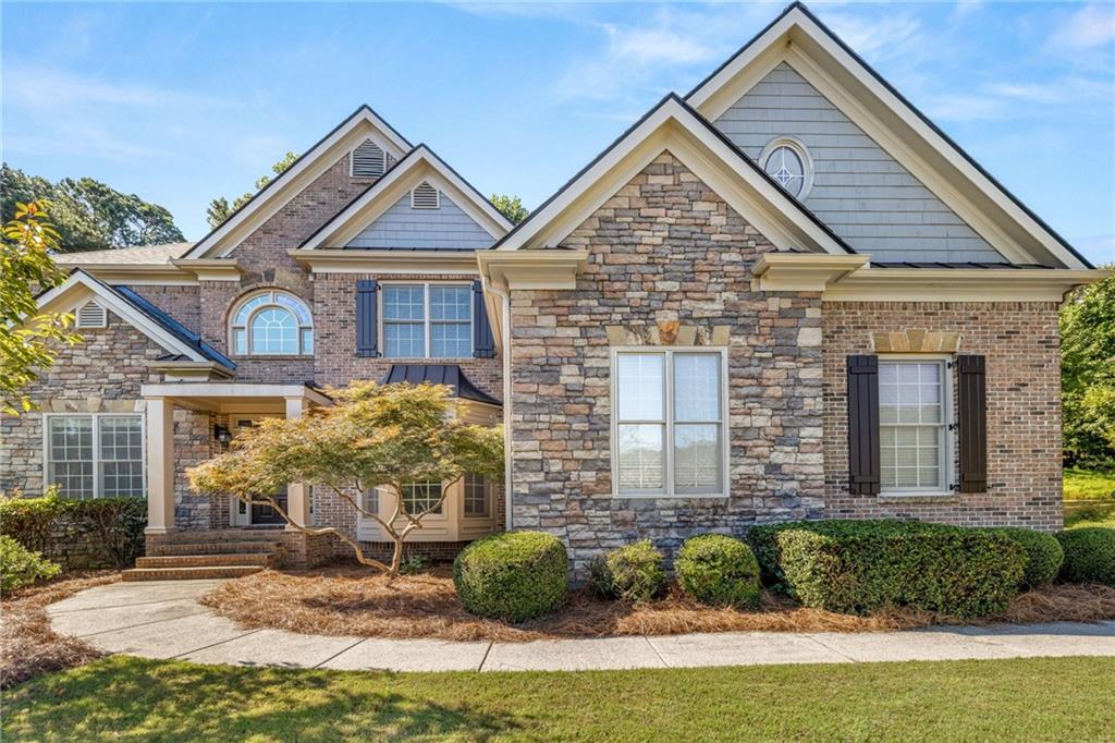 Don't miss the opportunity to rent this beautiful, spacious executive home nestled in a quiet, upscale neighborhood. Recently renovated flooring and freshly painted throughout. The large gourmet kitchen, featuring a breakfast area, overlooks the vaulted fireside keeping room. A coffered ceiling adorns the fireside great room, complete with built-ins and a wall of windows. The main-level bedroom includes a walk-in closet and full bath. Enjoy working from home in the main-level private office, which boasts a bookcase, desk, and French doors for privacy. The primary bedroom is expansive, offering a seating area with a fireplace. The master bath provides ample counter space with dual sinks, a generous shower, and a whirlpool tub for end-of-day relaxation. The walk-in closet features built-ins and a large island with drawers. Two upstairs bedrooms share a Jack-and-Jill bath, and an additional bedroom with a private bath completes the upstairs. Outdoor kitchen grill and refrigerator do not work. Homeowner removing/addressing. Pets are considered on a case-by-case basis with a nonrefundable deposit.