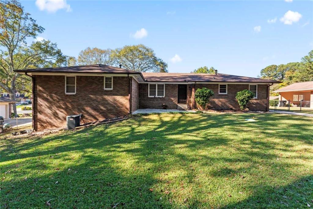 This well-maintained 4-sided brick home offers both comfort and style. Situated in a quiet neighborhood with no HOA, this property features a large front yard, perfect for outdoor relaxation, and a fully fenced-in backyard, ideal for family fun and pets.
As you approach, you'll be captivated by the home's architecture, highlighted by elegant arches. The inside is equally impressive. You'll find beautiful hardwood floors, a spacious living room, a dining area, and modern kitchen with granite countertops and stainless steel appliances.
The basement, almost entirely finished, offers a versatile space that can be customized to your needs. It includes a finished bathroom and an additional bedroom, providing endless possibilities.
Outside, you'll discover a raised bed garden, perfect for gardening enthusiasts, and an outbuilding, ideal for additional storage.
Enjoy the convenience of being close to the airport, downtown Atlanta, and numerous attractions and great restaurants.
Don't miss this opportunity to own a beautiful home in a desirable location. Schedule your showing today!