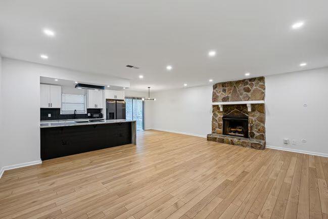 Updates galore and ready for tenants! Don't miss the opportunity to rent this 2 bedroom, 2.5 bath unit in Smyrna. This property boasts luxury vinyl plank floors, an updated kitchen with stainless steel appliances, modern finishes, large closets, a rock fireplace, a WASHER AND DRYER INCLUDED, and beautifully designed bathrooms.