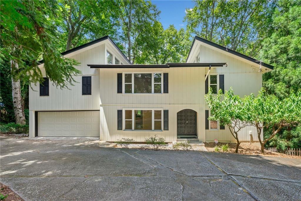 Located in one of Buckhead’s most coveted neighborhoods, this beautifully maintained 5-bedroom, 3.5-bathroom residence offers a rare blend of space, light, and functionality within minutes of top-rated schools and premier amenities.
Sunlight pours through oversized windows, highlighting the generous proportions of every room. The main level features a formal dining room, fireside living room, and an eat-in kitchen that opens directly onto a private deck—ideal for entertaining or quiet evenings at home. Upstairs, you’ll find four spacious bedrooms and two full baths, including a serene primary suite.
The fully finished terrace level provides incredible flexibility with a second kitchen, living area, bedroom, full bath, and its own private deck—perfect for guests, in-laws, or au pair living.
Additional features include a two-car garage, lush views, and unbeatable proximity to Brandon Primary, Sutton Middle, and North Atlanta High, as well as easy access to I-75, I-285, and Buckhead’s best dining and shopping destinations.
Timeless style meets modern livability in this thoughtfully designed home in the heart of Buckhead.