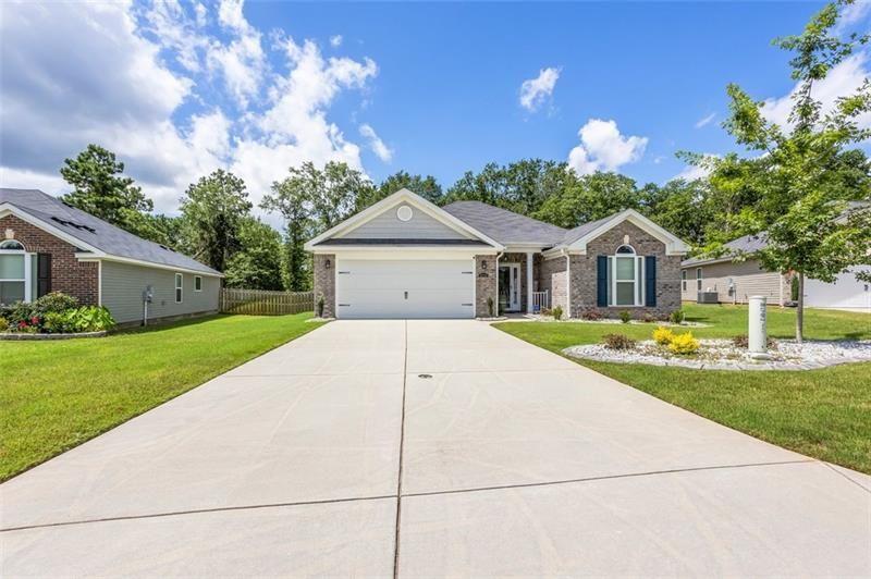 Step into a home that radiates warmth, care, and true pride of ownership. Nestled in a quiet Augusta neighborhood, this move-in-ready gem has been lovingly maintained and thoughtfully updated, offering the perfect blend of comfort, charm, and space. As you pull up, the professionally landscaped front yard—with beautiful stone accents—greets you with lush greenery, crisp edges, and vibrant curb appeal. All four sides of the property are fully sodded, kept healthy by a sprinkler system that makes the yard look like it's straight out of Southern Living. Step inside and feel the openness of the light-filled living area, anchored by a cozy stone fireplace that instantly makes you want to curl up with a good book. The kitchen sparkles with upgraded appliances and features venting to the outside—perfect for keeping the space fresh when cooking. Now imagine walking out to the screened-in back porch. You can almost smell the burgers sizzling on the grill out on the extra concrete slab, just steps away. The fully fenced backyard offers privacy and security, whether you're letting pets roam, watching kids play, or setting up for a backyard gathering. Beyond the fence, there's even extra yard space—room for a garden, fire pit, or simply a quiet escape under the Georgia sky. Every corner of this home has been thoughtfully cared for, blending modern updates with a warm, inviting atmosphere. Whether you're a first-time buyer, busy professional, or growing family, you'll find spaces to live, work, and entertain with ease. Homes this well-kept and thoughtfully designed don't last long. Schedule your private showing today and see for yourself why 2528 Fieldcrest Dr is ready for its next chapter—with you in it.
