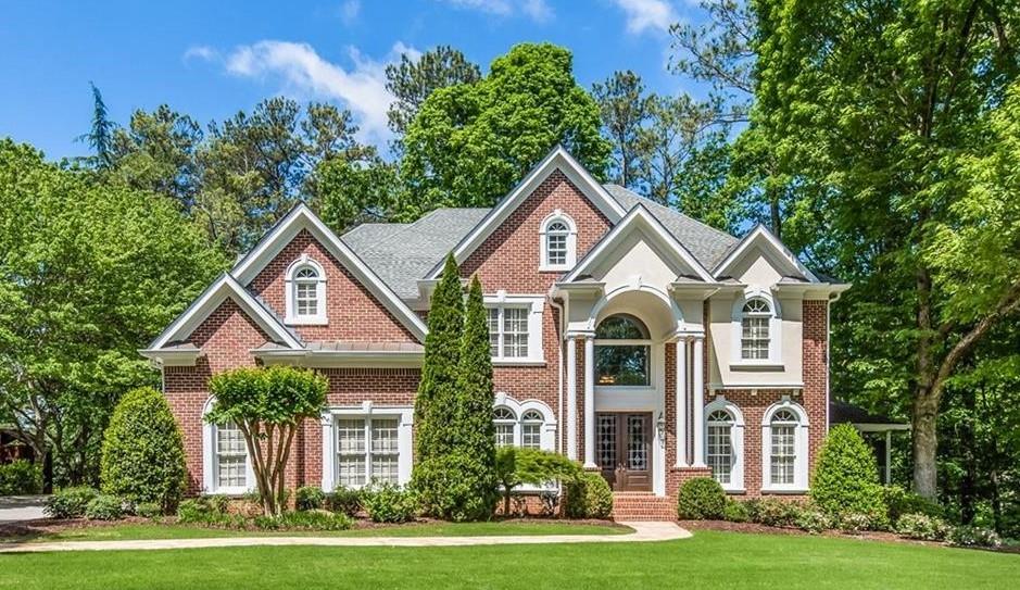 VACATION LIVING IN THE HEART OF EAST COBB!!! LOCATED ON ONE OF THE LARGEST LOTS IN SOUGHT-AFTER MADISON HALL SUBDIVISION, THIS EXQUISITE LAKEFRONT ESTATE IS AN ABSOLUTE GEM!! BOASTING 180-DEGREE LAKE-VIEWS FROM ALL THREE LEVELS, OVER TEN ROOMS HAVE A GORGEOUS VIEW! WALK UP THE NEW FLAGSTONE-PAVED WALKWAY THROUGH CUSTOM, CAST-IRON DOUBLE DOORS INTO THE SOARING 2 STORY ENTRYWAY WITH INTRICATE CROWN MOLDING, GLEAMING HARDWOODS AND HUGE PICTURE WINDOWS OVERLOOKING THE LAKE! THE OPEN FLOOR PLAN, WITH PICTURESQUE GREAT ROOM, SKI LODGE FIREPLACE WITH BUILT-INS, AND HUGE DECK ON THE LAKE IS A WELCOME RETREAT!! BEAUTIFUL CHEF'S KITCHEN FEATURES NEW QUARTZ COUNTERTOPS AND MODERN SUBWAY TILE BACKSPLASH.  HIGH-END STAINLESS STEEL APPLIANCES INCLUDE A THERMADOR DOUBLE OVEN, MICROWAVE, AND VENT HOOD, DACOR GAS RANGE, AND BOSCH DISHWASHER.  LARGE SEPARATE DINING ROOM SEATS 12+.  EXPANSIVE THREE CAR GARAGE AND NEWLY-PAVED DRIVEWAY PROVIDE PLENTY OF PARKING FOR GUESTS. PRIVATE OFFICE OR FORMAL LIVING ROOM CONNECTS TO SCREENED IN SIDE PORCH. RELAX AND ENJOY YOUR MORNING COFFEE WHILE WATCHING THE FAMILY OF GEESE GLIDE ACROSS THE LAKE! TURTLES AND DUCKS ALSO COMPETE FOR THE SPOTLIGHT. FISHING IS A BREEZE FROM YOUR OWN BACKYARD OR CANOE. TAKE A PADDLE BOARD OUT FOR A SUNSET CRUISE BEFORE DINNER OR BOAT DIRECTLY OVER TO THE NEIGHBORHOOD POOL AND TENNIS COURTS! BACK INSIDE, A SPACIOUS BEDROOM WITH ADJOINING PORCH -ALSO HAVE GREAT WATER VIEWS. A FULL BATH, HALF BATH AND LAUNDRY/MUDROOM COMPLETE THE MAIN FLOOR. MORE GORGEOUS LAKE VIEWS AS YOU HEAD TO THE UPPER LEVEL. RETREAT TO THE LARGE OWNERS' SUITE TO READ A BOOK BY WITH FIREPLACE OR ENJOY A GLASS OF WINE IN THE SOAKING TUB. SPACIOUS MASTER ENSUITE INCLUDES DUAL SINKS, WALK IN GLASS SHOWER, AND ENORMOUS CLOSET WITH A WINDOW. THREE ADDITIONAL BEDROOMS AND TWO FULL BATHS ARE ALSO LOCATED ON THE UPPER LEVEL.  THE FULLY-FINISHED LOWER LEVEL OFFERS AN ADDITIONAL BEDROOM OPTION WITH CLOSET AND FULL BATH. PLENTY OF SPACE FOR A POOL TABLE, MEDIA ROOM AND WORKOUT ROOM.  LARGE STORAGE ROOM AND WALK-OUT PATIO. ADDITIONAL HOME UPGRADES INCLUDE NEW, WHOLE-HOUSE, COMMERCIAL-GRADE COPPER PIPING WITH WATER MONITORING METER. TWO NEW 50 GALLON HOT WATER HEATERS, RECENTLY REFINISHED HARDWOODS, WHOLE ROOM AUDIO IN KITCHEN AND DINING ROOM, NEW QUARTZ AND GRANITE COUNTERTOPS IN THE KITCHEN AND BATHS. FRESH, NEUTRAL, PAINT THROUGHOUT.  RECENT PROFESSIONAL WINDOW AND GUTTER CLEANING. NEW HVAC FILTERS AND CONDENSATION PUMP. HURRY! THIS OUTSTANDING SWIM/TENNIS COMMUNITY LAKEFRONT HOME WON'T LAST! CLOSE TO A TRIFECTA OF TOP SCHOOLS, SHOPPING, ENTERTAINMENT, PARKS AND TRAILS, IT TRULY CHECKS EVERY BOX IMAGINABLE!!!