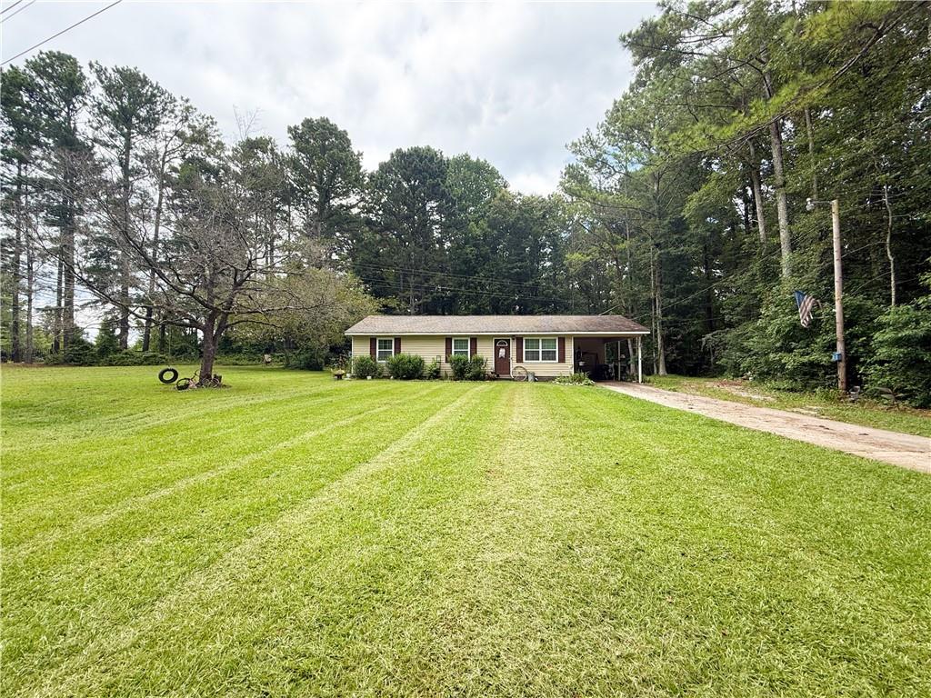 Welcome home! Beautiful 3-bedroom, 1-bath ranch-style home nestled on a serene 2-acre level lot. With a spacious front and back yard and a wooded perimeter offering the perfect blend of open space and privacy. Located in Temple High School district, ideal for those seeking both convenience and tranquility. Step inside to a warm and inviting layout featuring a family room that flows effortlessly into a cozy country kitchen and dining area, perfect for everyday living. The home offers central electric heating and cooling, a mix of LVP and carpet flooring and a dedicated laundry room conveniently located off the kitchen. Outside, you’ll love the fully fenced backyard, great for kids, pets, or your own outdoor retreat. The surrounding wooded areas provide additional seclusion and potential for expansion, gardening, or simply enjoying the peace and quiet of nature. Located in USDA-eligible area, no down payment required for qualified buyers! Don’t miss your chance to make this charming home yours. Call today!