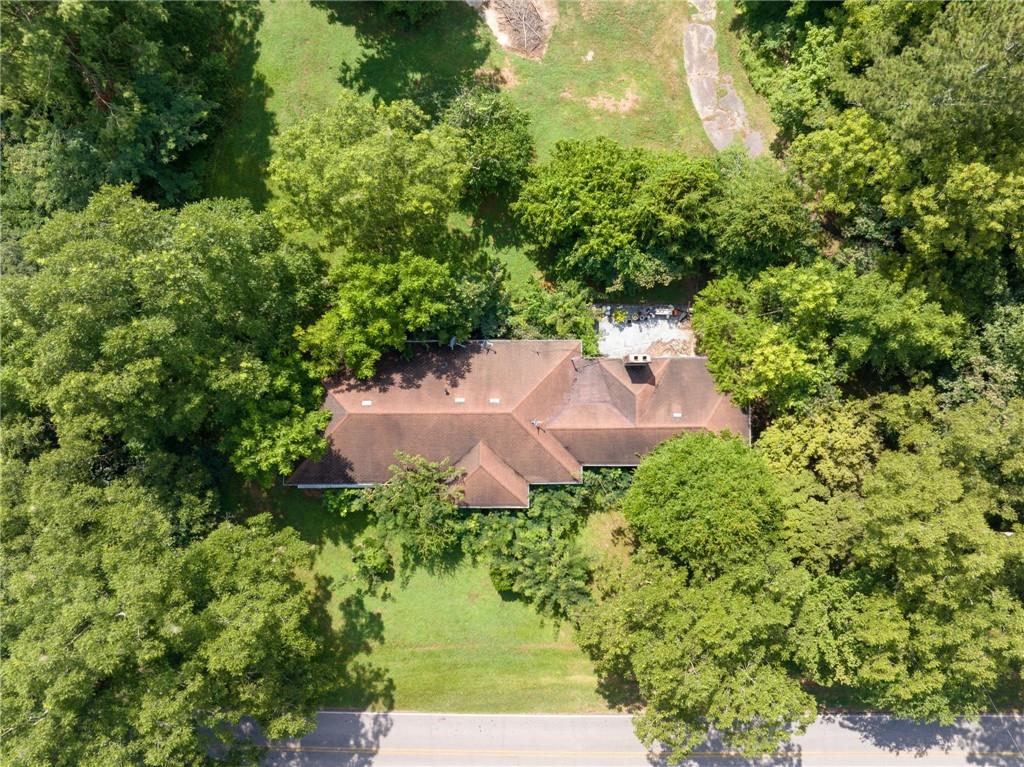 Exquisite +/-55 acres rural land PCFD (Planned Commercial Farm District) zoned agriculture offering natural beauty, development potential, plentiful wildlife, desirable spring-fed pond and creeks, and complete privacy. This unique country land is perfectly situated between 2 exits on Interstate 85 North near GA 129, each exit about 2 miles to the property. Potential residential development requires minimum 1/2 acre lots. No floodplains or wetlands on the land. Adjacent to Heritage of Jefferson subdivision built in 2014 with Avg Home Values $500k. Potential commercial/industrial development with proximity to nearby warehouses and distributors. Jefferson, Georgia is located in Northeast Georgia, about 45 minutes from Metro Atlanta and 75 minutes from Hartsfield-Jackson Airport in Atlanta. Acreage consists of two adjoining parcels 079-018 with 44 acres and 079-009G with 12 acres and +/-590 feet of road frontage. The property is adjacent to the City Limits of Jefferson with potential to be annexed. City water and sewer on the property. High ranking schools locally and nationally. Jackson County Airport is only 5 miles away. There is a ranch home with a basement on the land leased to a tenant. USDA eligible.
