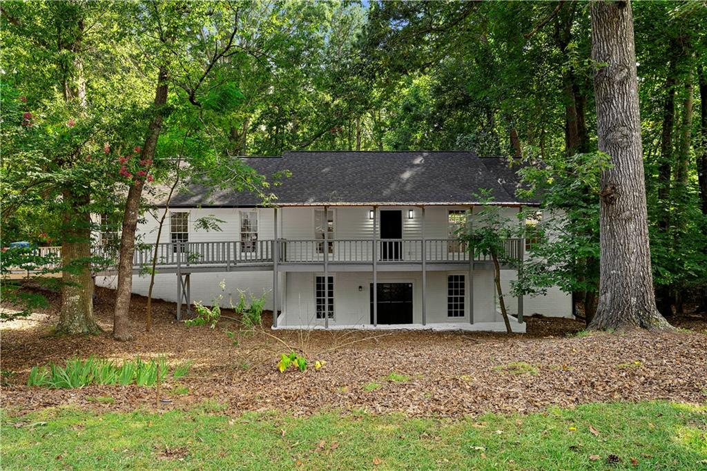 Beautifully renovated ranch in Athens. Step into a gorgeous living room with a cozy masonry fireplace, perfect for entertaining. The kitchen features stainless steel appliances, white cabinets, stone counters, a tiled backsplash, and black hardware. The master suite offers a large bedroom and a spacious bathroom with a double vanity, standalone shower, and black hardware. The second bath has been similarly updated. The backyard is great for entertaining, with a large patio that includes a screened-in area. Other highlights include a full unfinished basement with plenty of storage and a two-car garage.