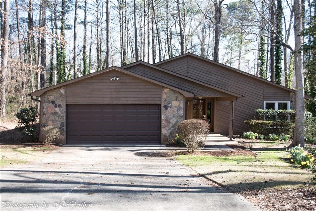 Newly Renovated beautiful Ranch home. Located within 2 miles of I-75! All new flooring. Bathrooms updated, Interior and exterior paint. Absolutely move-in ready!! Great schools, great shopping within minutes. Minutes from Lake Allatoona and Town Center Mall. Culdesac wooded lot with a lot of privacy. Screened in back porch and a huge open deck.