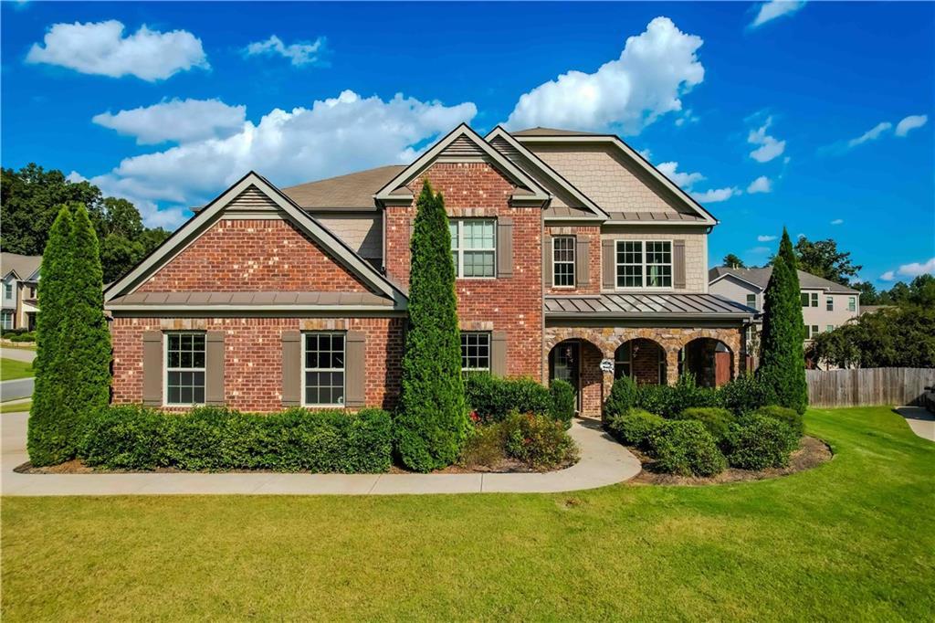Beautiful 5-bedroom, 4-bath home with over 4,200 sq. ft. in a highly desirable swim community. Nestled on a spacious corner lot at the front of a cul-de-sac, this property offers a perfect mix of style and comfort.
The main floor features hardwoods throughout, soaring two-story ceilings, a guest bedroom with full bath, and a large family room with fireplace and custom built-ins. The open kitchen is a chef’s dream with upgraded granite counters, double ovens, gas cooktop, stainless steel appliances, an oversized island with seating, and plenty of cabinetry.
Upstairs, the oversized owner’s suite boasts a spa-like bath with soaking tub, separate shower, granite counters, and a walk-in closet. Three additional bedrooms include a Jack & Jill bath, a full bath, and spacious closets. A bright loft provides extra space for relaxing or entertaining.
Completing this home is a 3-car side-entry garage with additional storage and beautifully landscaped surroundings.