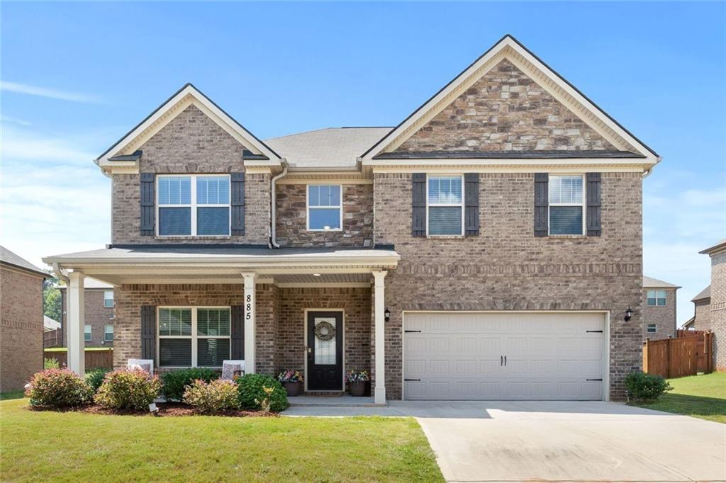 Only 4 years young, this 4-sided brick beauty with a fenced backyard is a rare find at this price point! The seller is even offering $5,000 toward closing costs, plus, qualified buyers can take advantage of a conventional assumable loan at an incredible 3.625% interest rate to make homeownership even more affordable. Step onto the inviting rocking chair front porch, perfect for your morning coffee or tea, then step inside to a soaring 2-story foyer. This home offers a formal living room that can also be turned into office space and a formal dining room that flows seamlessly into the kitchen, creating an ideal setup for entertaining. The kitchen features an eat-in area and opens to the spacious family room with a cozy fireplace at its heart. Upstairs, you’ll find four generously sized bedrooms with vaulted ceilings. The oversized owner’s suite is a true retreat, with plenty of space to create your ideal sitting area and a walk-in closet that fits all your personal essentials with ease. Location seals the deal, just 12 minutes to downtown Fayetteville and a short drive to Trilith Live, offering a luxury cinema, an 1,800-seat auditorium, 2 live TV stages, an indoor atrium, outdoor plaza with water features for summertime fun, restaurants and boutique shops you’ll love. In addition, only 35 minutes to both Atlanta Hartsfield Airport and into Downtown Atlanta and less than 15 minutes to Atlanta Motor Speedway to enjoy the GA State Fair & so many other outdoor fun activities year round. This home has it all, affordability, style, and convenience. Schedule your appointment today, before it's gone tomorrow. Don’t miss it!