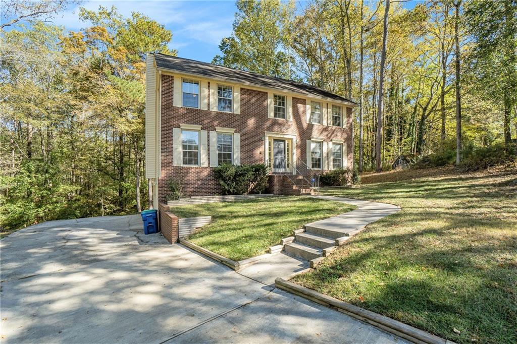 Imagine a home designed for real life, stylish, functional, and full of light. That is what you will find at 145 Shadybrook Lane SW, a beautifully renovated three bedroom, two and a half bath home on just over three acres in a quiet cul de sac in Southwest Atlanta. Each room is thoughtfully defined, offering cozy and separate spaces for everyday living and entertaining.
The main level includes a convenient half bath and laundry area, while the family room features a warm fireplace and access to a deck that also connects to the kitchen, making indoor and outdoor living seamless. The kitchen provides stainless steel appliances, sleek cabinetry, and ample counter space for cooking and hosting gatherings. Upstairs, the primary suite includes a versatile bonus room that can serve as a home office, nursery, or private sitting area.
Additional features include a one year old HVAC system, a two and a half year old water heater, and a two car garage with extra attached space for storage. Located close to shopping, dining, and major highways, this home offers the perfect balance of privacy, functionality, and convenience. Move in and make it yours today.