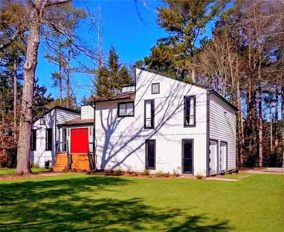Motivated Sellers !!!Stunning Contemporary Home in a Serene Community
Welcome to this beautifully renovated, contemporary home that offers the perfect blend of style, comfort, and nature. As you enter, you’ll immediately notice the open concept design, featuring soaring high ceilings and an abundance of windows that fill the space with natural light.
The brand new kitchen boasts sleek, white cabinets paired with upgraded appliances, making it both a chefs dream and a stylish focal point. You will love the attention to detail, including freshly painted interiors, new flooring throughout, and renovated bathrooms that bring a modern touch to every room.
This home sits on a spacious corner lot in a quiet, tree-filled neighborhood, offering peace and tranquility. Step outside onto the deck, where you can unwind with a cup of coffee and enjoy the serene surroundings.
Additional features include a two car garage, providing plenty of space for your vehicles and storage needs. This is the perfect place to call home, combining modern updates with a beautiful natural setting.
Do not miss your chance to own this stunning property!
