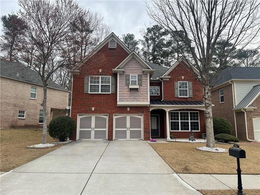 This property offers a fantastic location with excellent schools (only a 4-minute drive to Chattahoochee High School) in Johns Creek. It features hardwood floors, a bedroom, a full bath on the main level, and a large kitchen with ample cabinets. The secondary bedrooms are spacious, while the master suite is enormous, with a sitting room and a cozy fireplace. There's also a covered porch off the master suite leading to a private backyard. This is a terrific location and a great value.