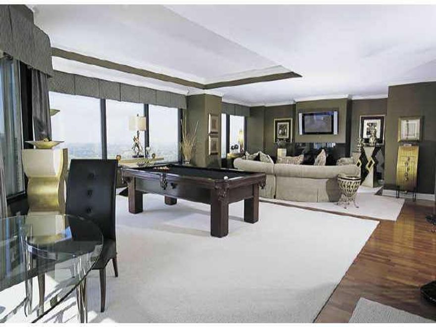 Motivated owner- Entire 31st floor w/ 360 degree views, pvt elevator, 2 lvng rms, 3 fireplaces, 4 corner balconies,pvt spa w/steam room,wet bar & 5 parking spaces.