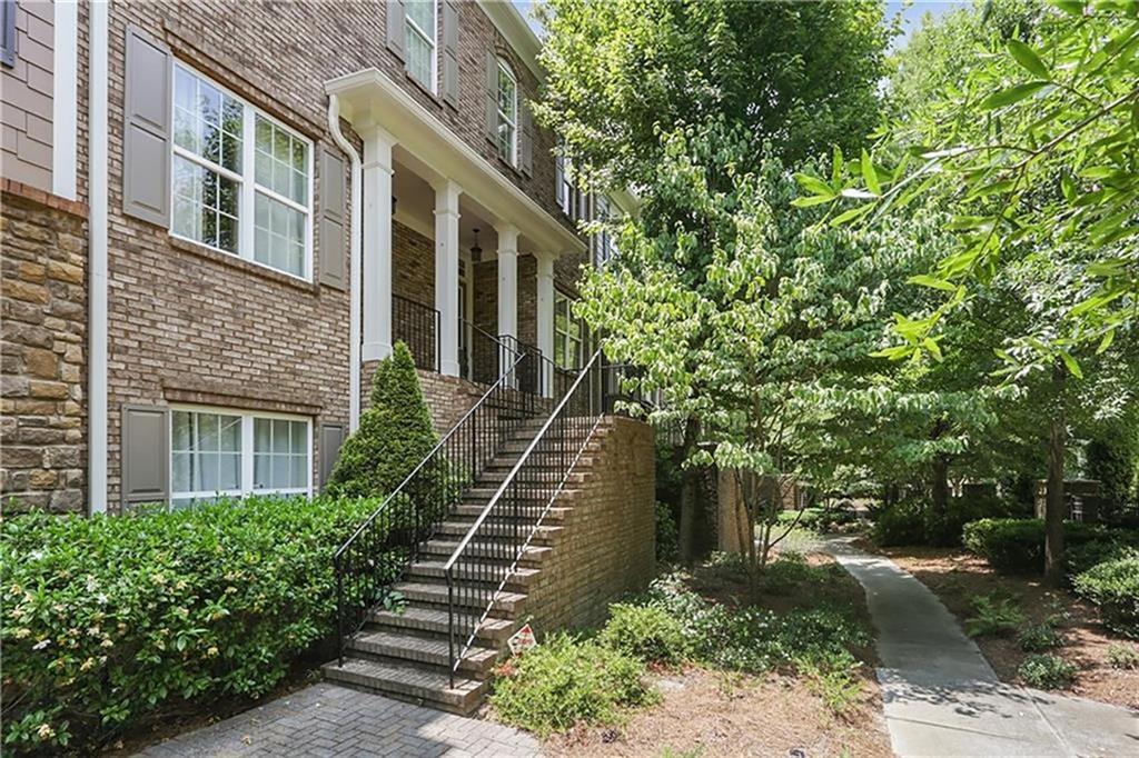 Located in a gated community, this beautifully designed townhome offers space, style, and incredible convenience. The open main level features a chef’s kitchen with granite countertops, stainless steel appliances, and a large island, flowing seamlessly into a light-filled great room with gas fireplace, built-ins, and wine rack. French doors open to a spacious deck—perfect for entertaining or relaxing. Upstairs, the oversized primary suite boasts soaring ceilings, a spa-like bath with separate tub and shower, and a custom California-style closet. A secondary bedroom with en-suite bath adds flexibility, while the terrace-level room, with full bath, makes an ideal office or guest space. A two-car garage and unbeatable location, just across from Briarwood Park, complete this exceptional home.